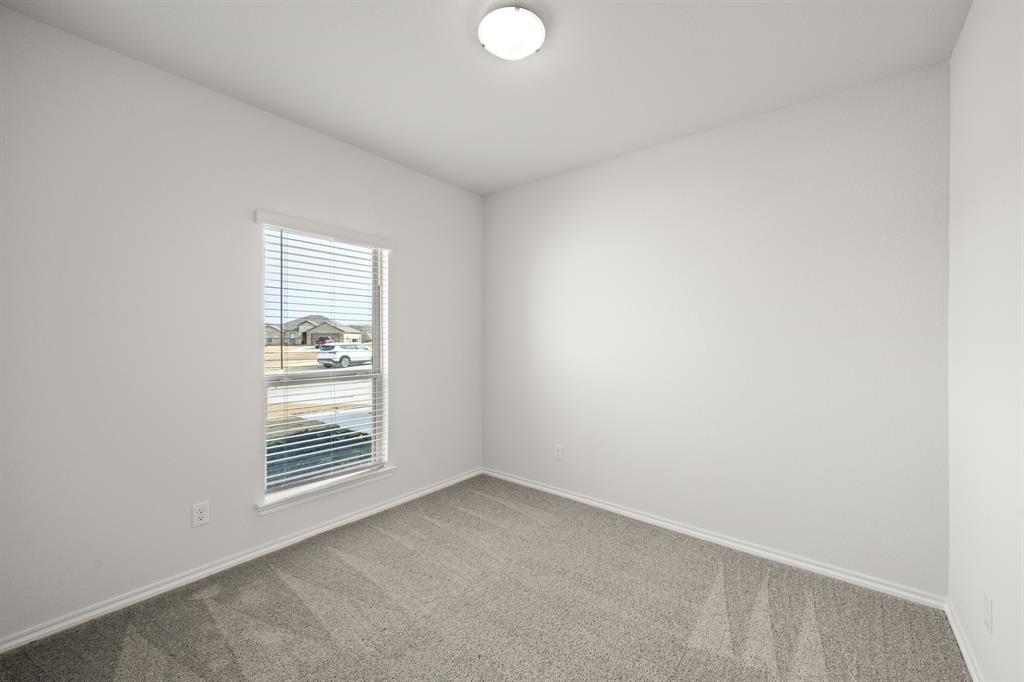 1184 Oak Spring Drive Burleson, TX 76028 - Photo 14 of 27 an empty room with windows