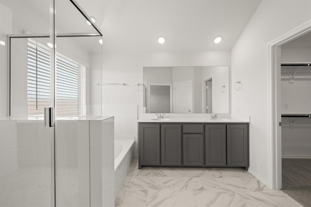 1184 Oak Spring Drive Burleson, TX 76028 - Photo 20 of 27 a bathroom with a granite countertop sink and a mirror
