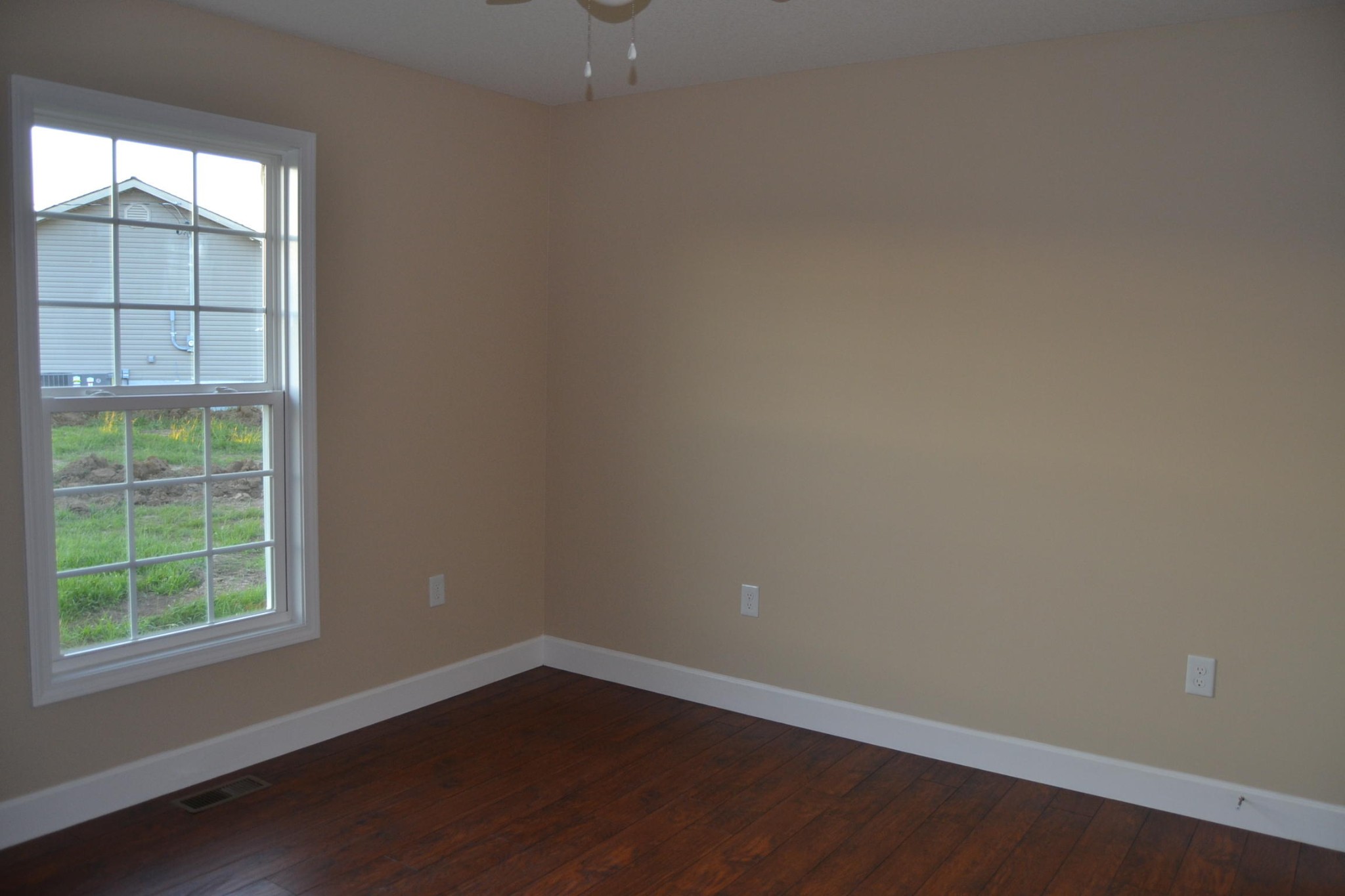 41 York Road Crossville, TN 38555 - Photo 13 of 17 an empty room with wooden floor and windows