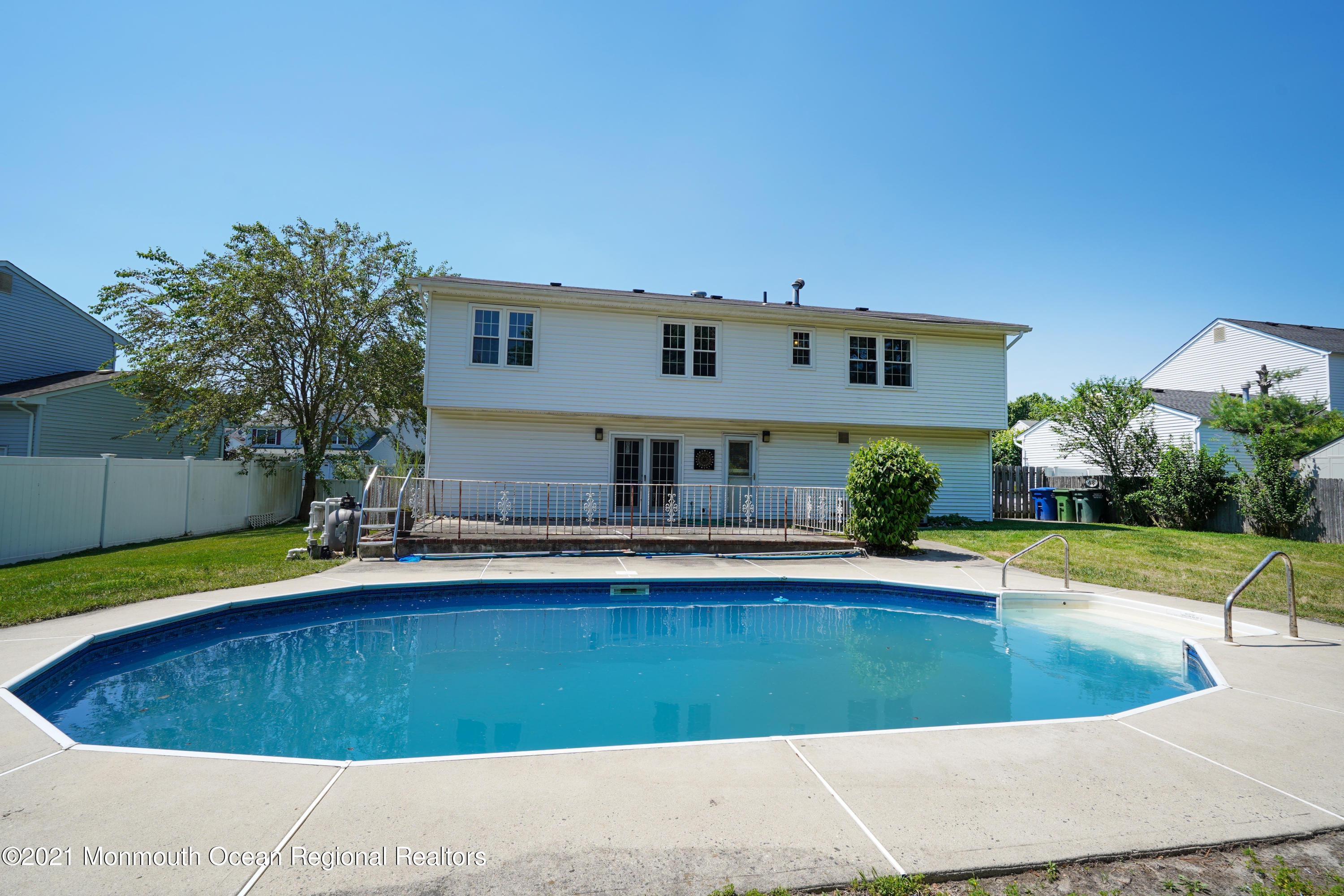 52 Danbury Road Tinton Falls, NJ 07753 - Photo 2 of 50 a view of swimming pool with outdoor seating
