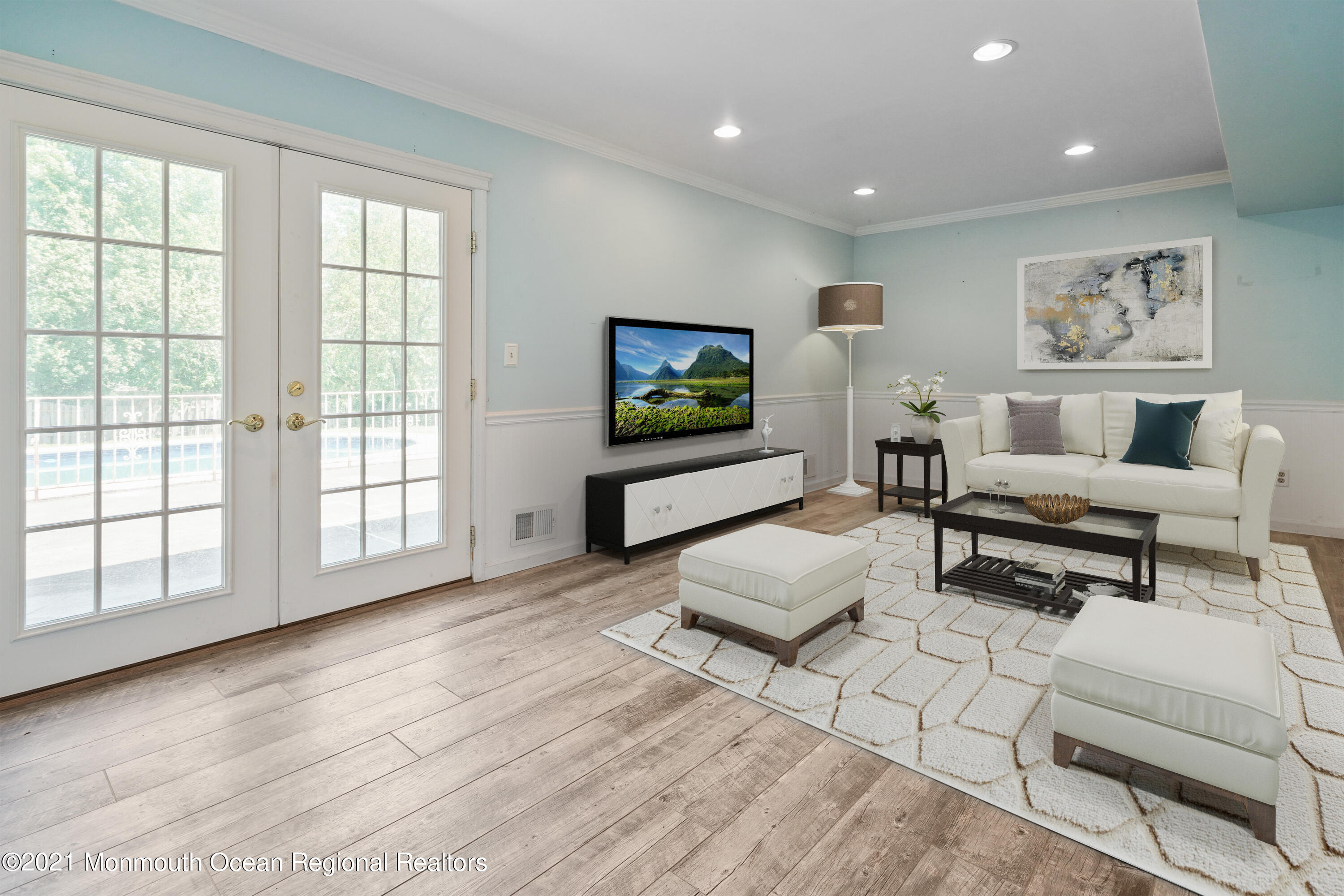 52 Danbury Road Tinton Falls, NJ 07753 - Photo 13 of 50 a living room with furniture and a flat screen tv