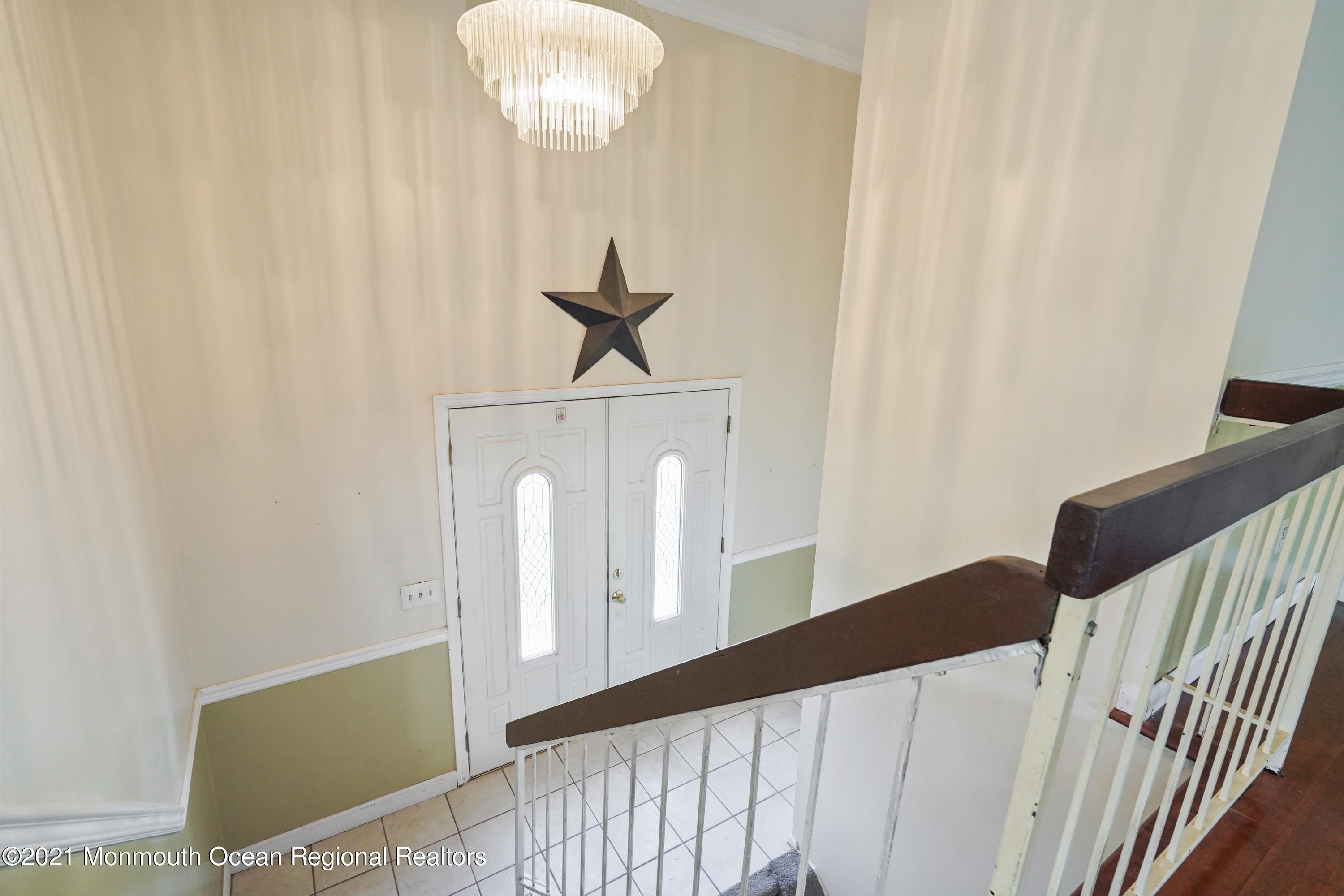 52 Danbury Road Tinton Falls, NJ 07753 - Photo 17 of 50 a view of a hallway with windows