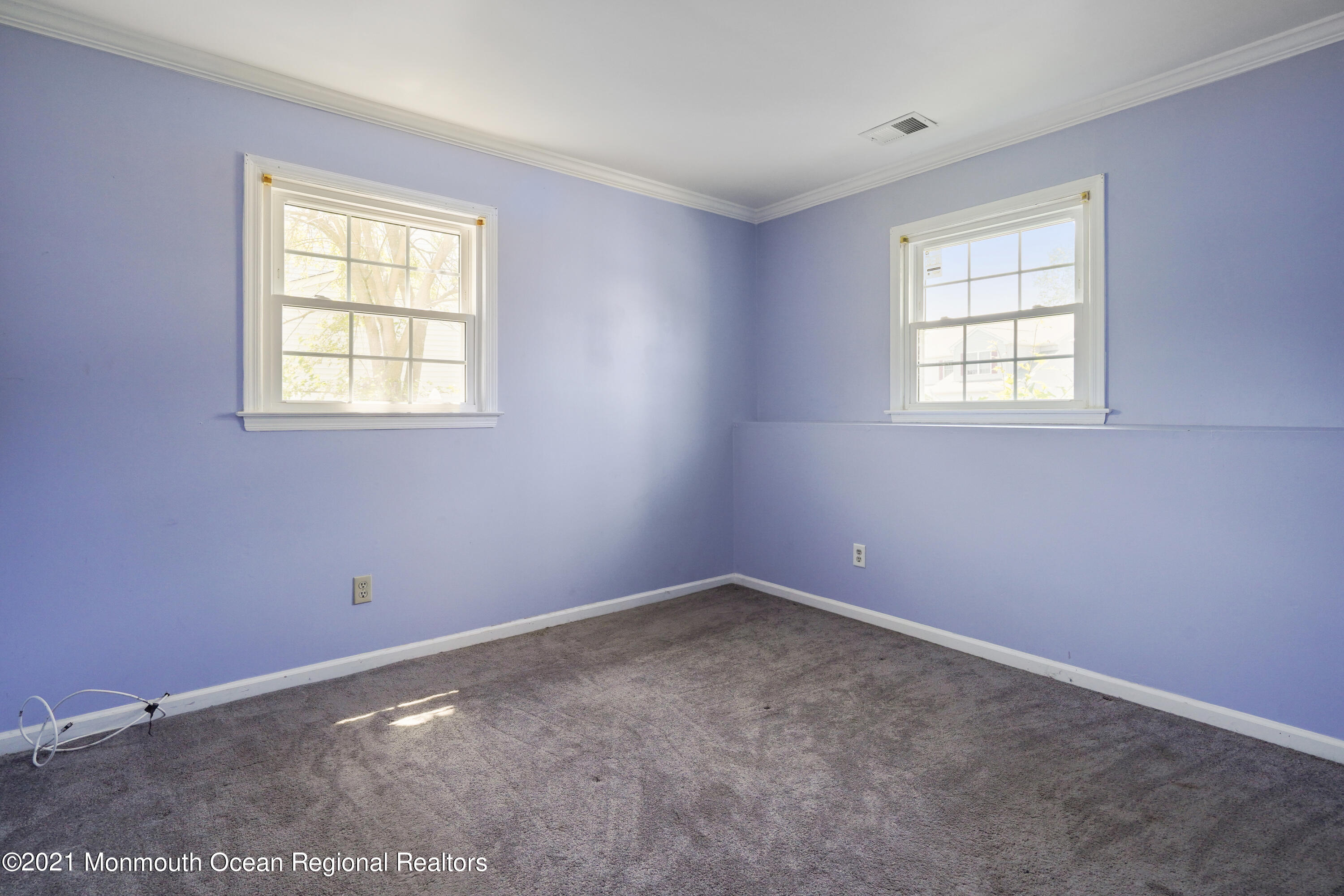 52 Danbury Road Tinton Falls, NJ 07753 - Photo 19 of 50 an empty room with a window