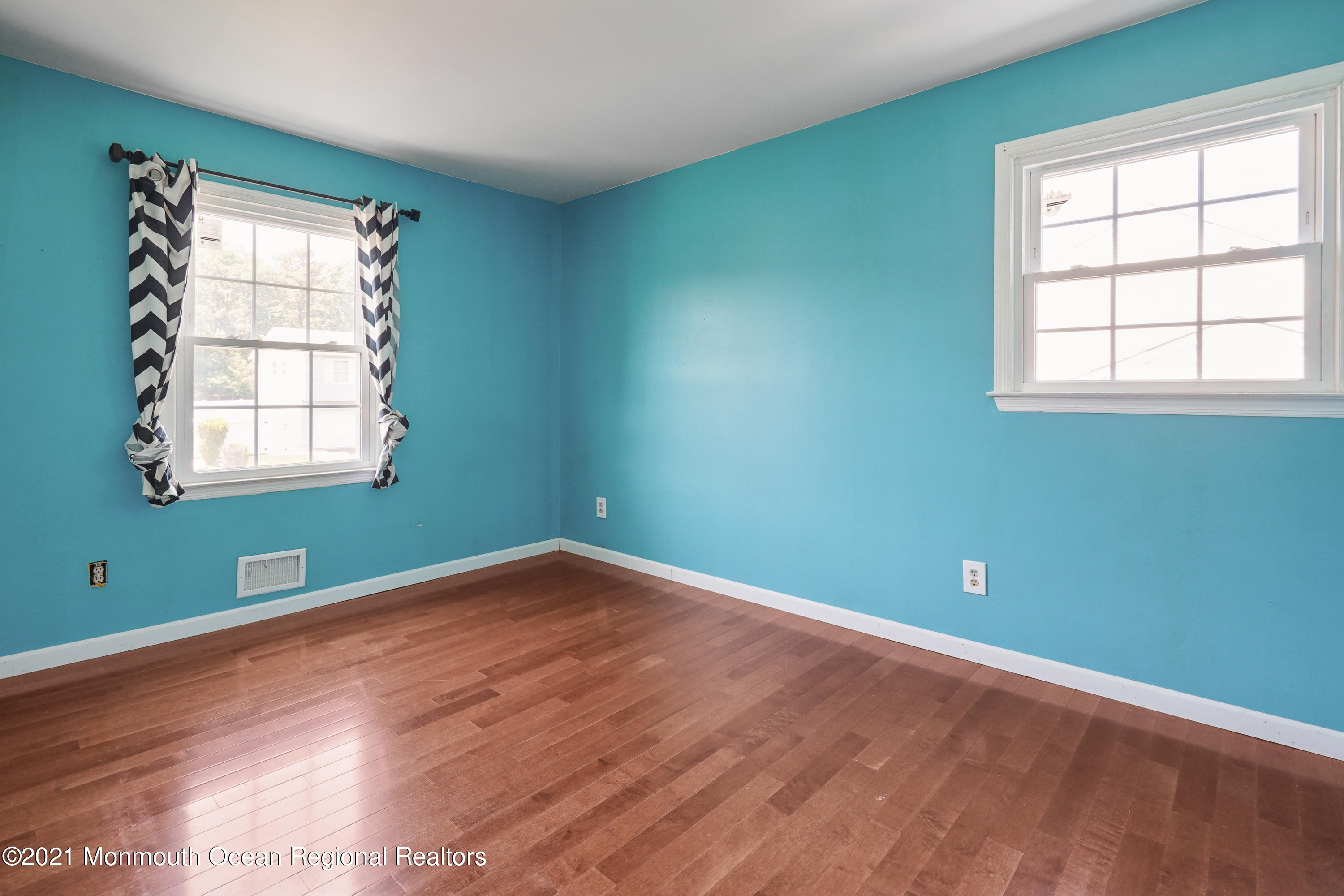 52 Danbury Road Tinton Falls, NJ 07753 - Photo 25 of 50 an empty room with windows and closet
