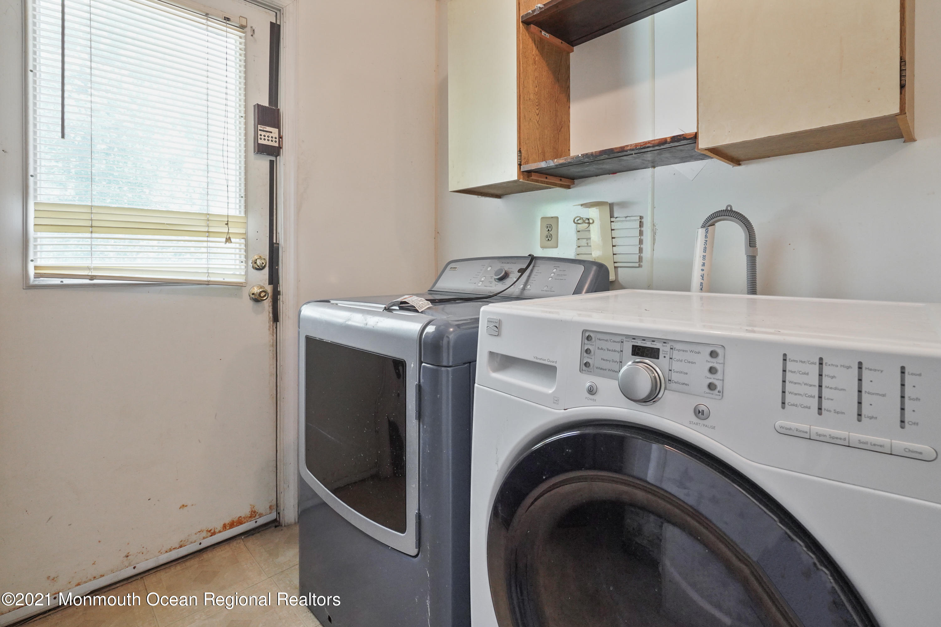 52 Danbury Road Tinton Falls, NJ 07753 - Photo 27 of 50 a utility room with dryer and washer
