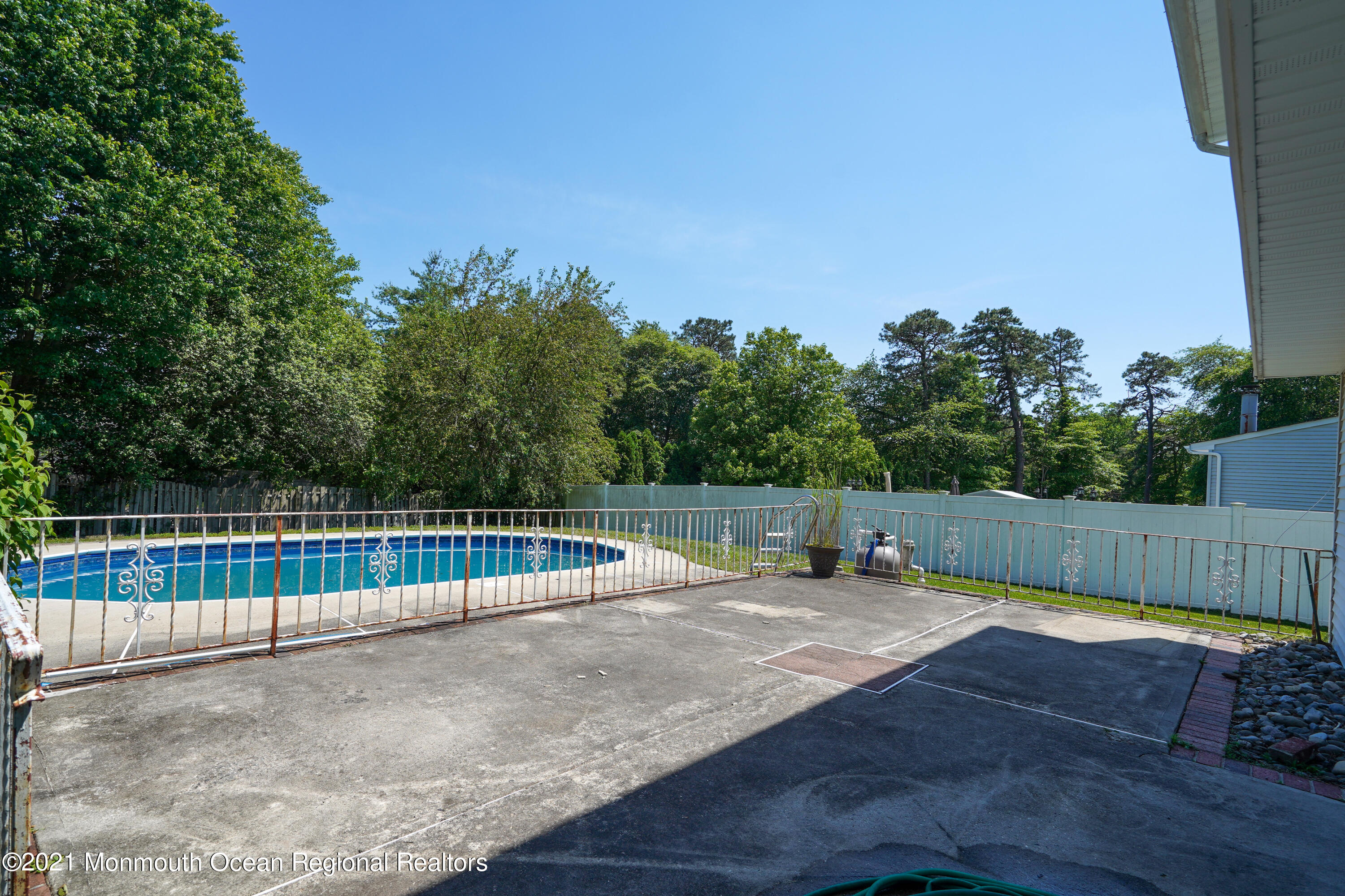 52 Danbury Road Tinton Falls, NJ 07753 - Photo 31 of 50 a view of swimming pool with a patio