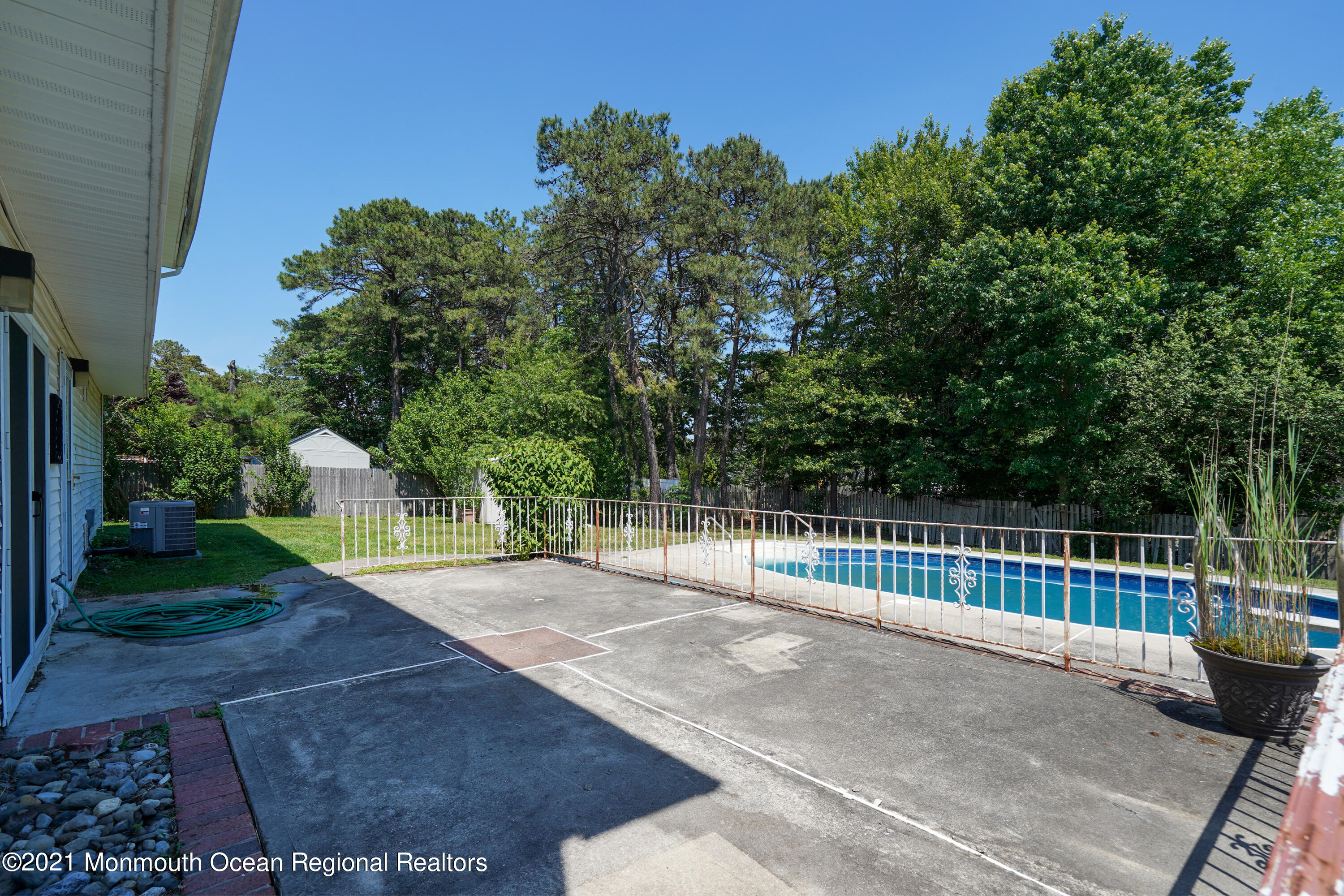 52 Danbury Road Tinton Falls, NJ 07753 - Photo 33 of 50 a view of a backyard with a trees