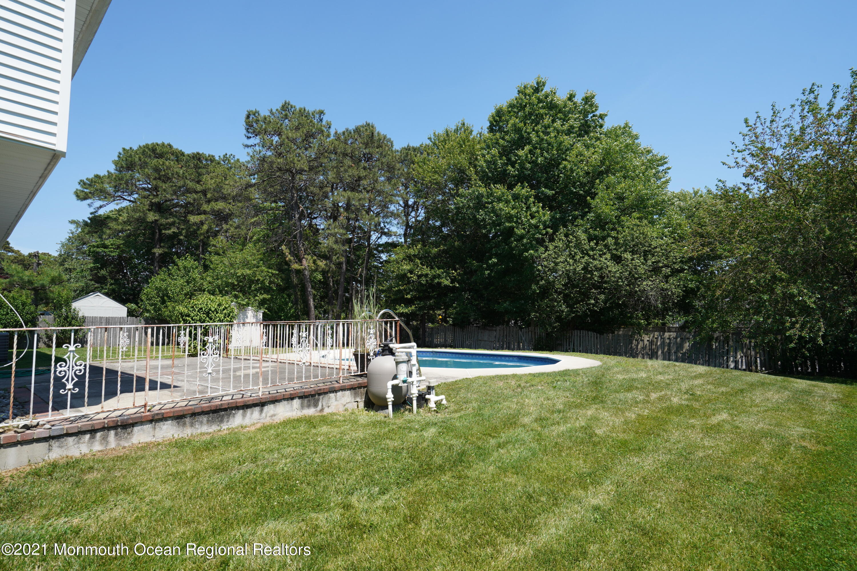 52 Danbury Road Tinton Falls, NJ 07753 - Photo 34 of 50 a view of a backyard with a small pool