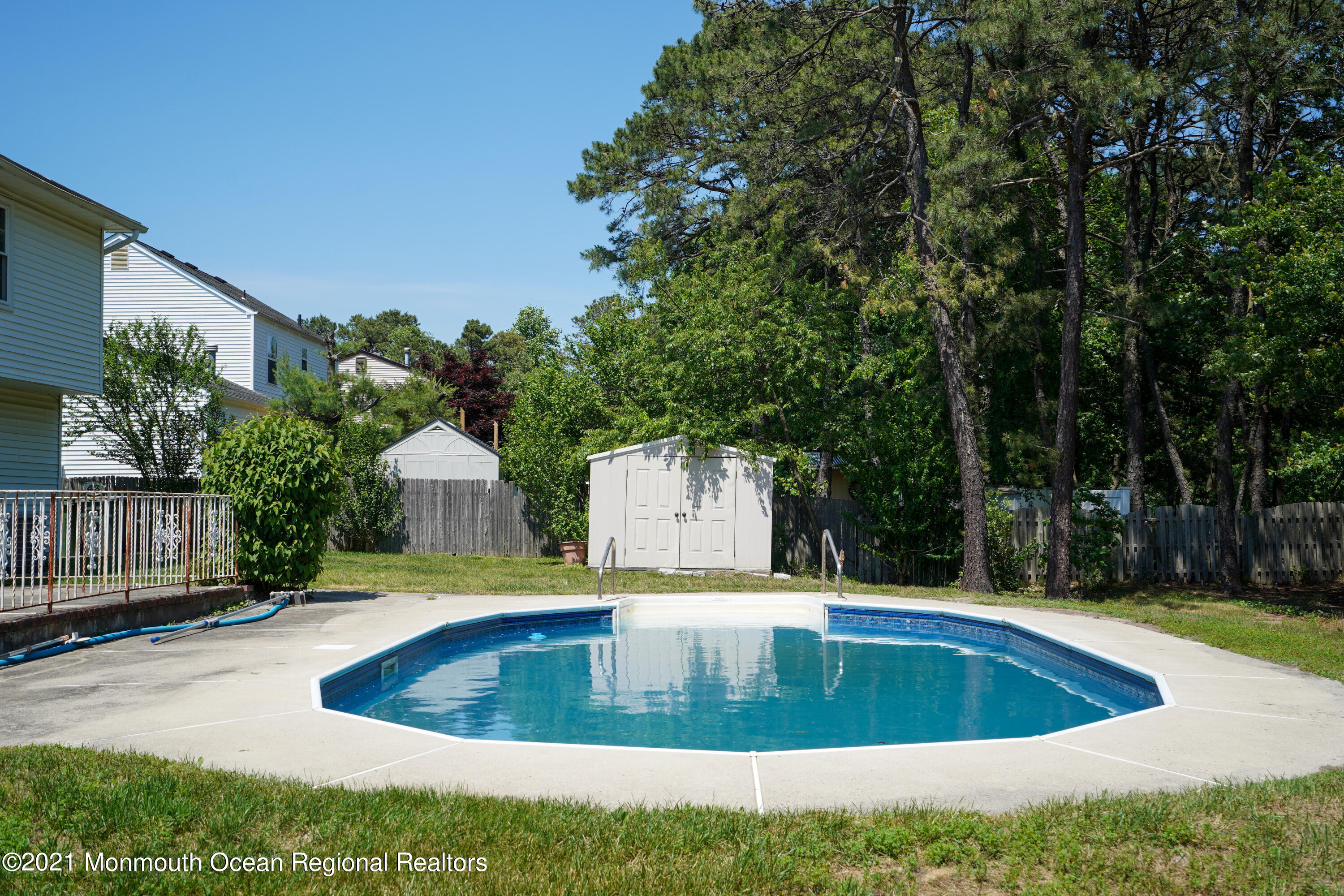 52 Danbury Road Tinton Falls, NJ 07753 - Photo 36 of 50 a view of a swimming pool with an outdoor space