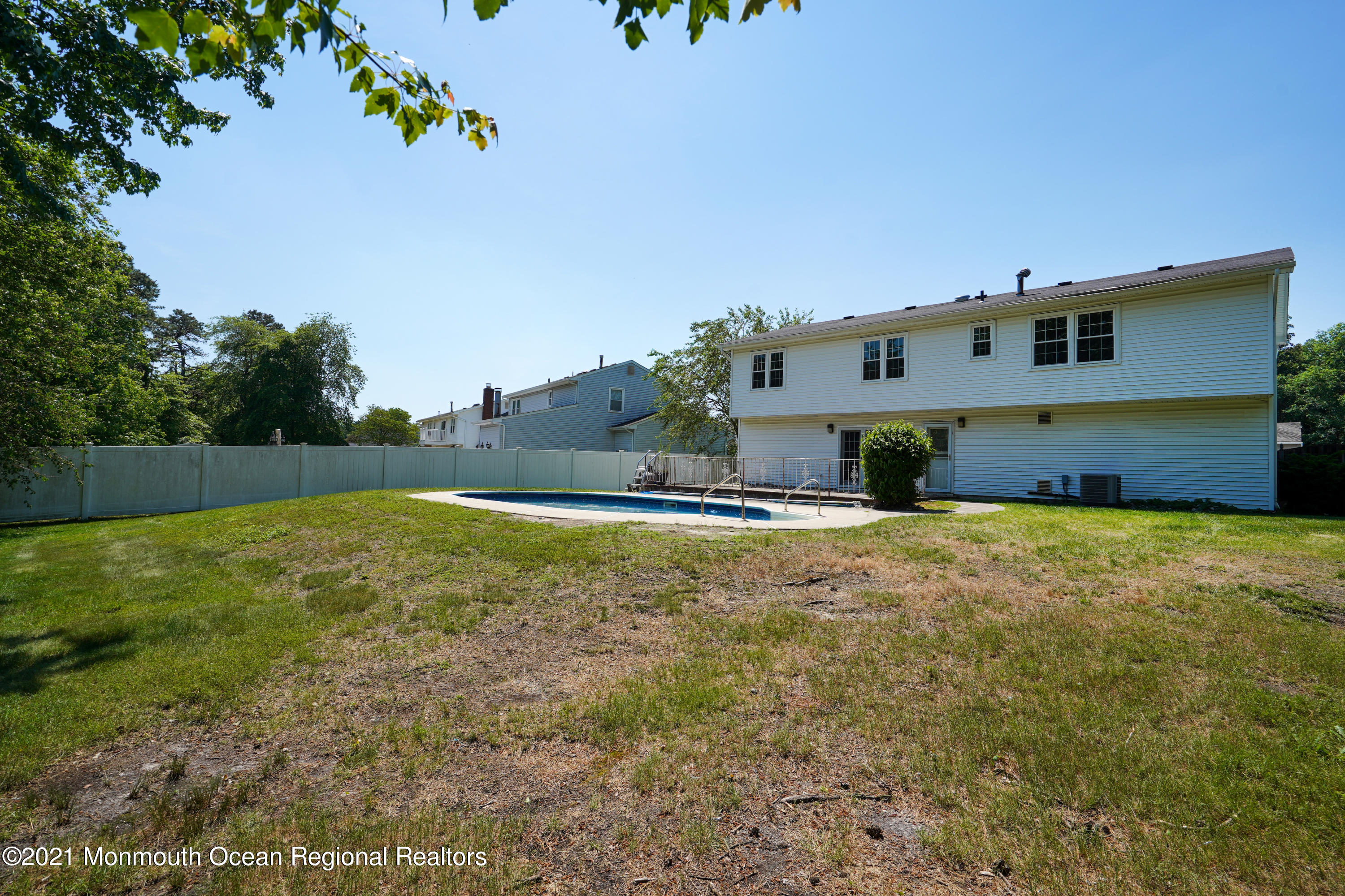 52 Danbury Road Tinton Falls, NJ 07753 - Photo 39 of 50 a view of a house with a yard