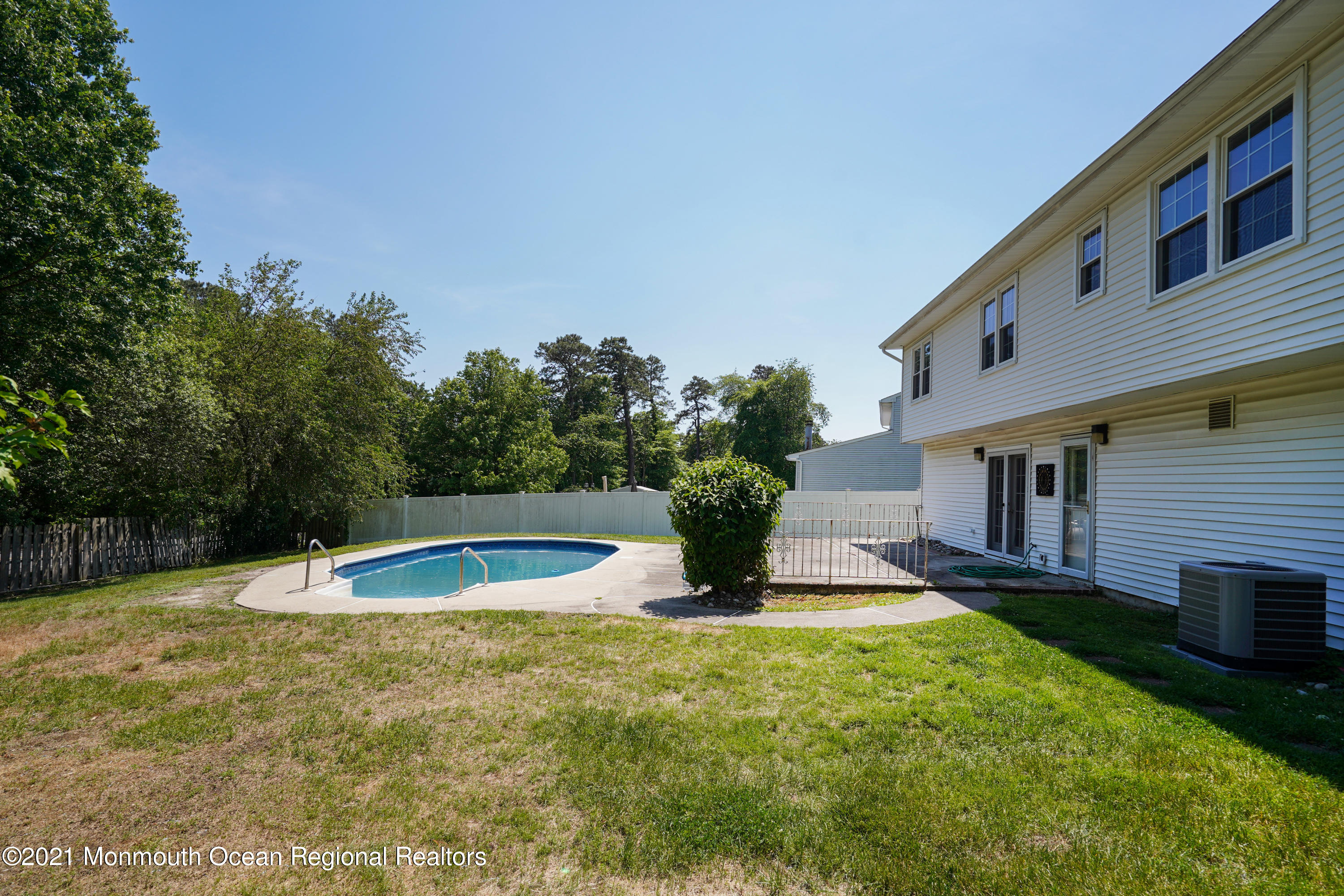 52 Danbury Road Tinton Falls, NJ 07753 - Photo 41 of 50 a view of a house with a yard and sitting area
