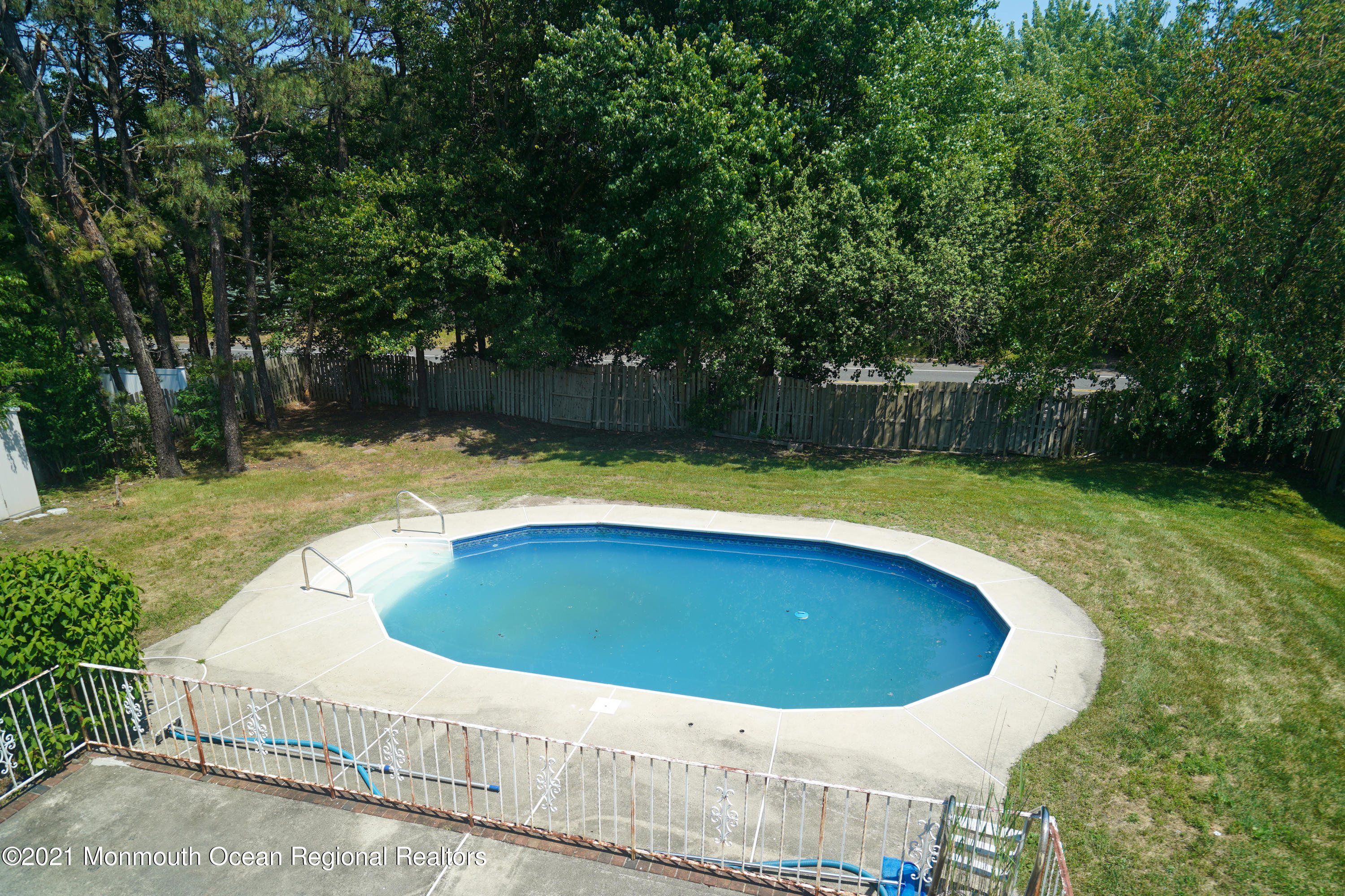 52 Danbury Road Tinton Falls, NJ 07753 - Photo 43 of 50 a view of swimming pool with garden