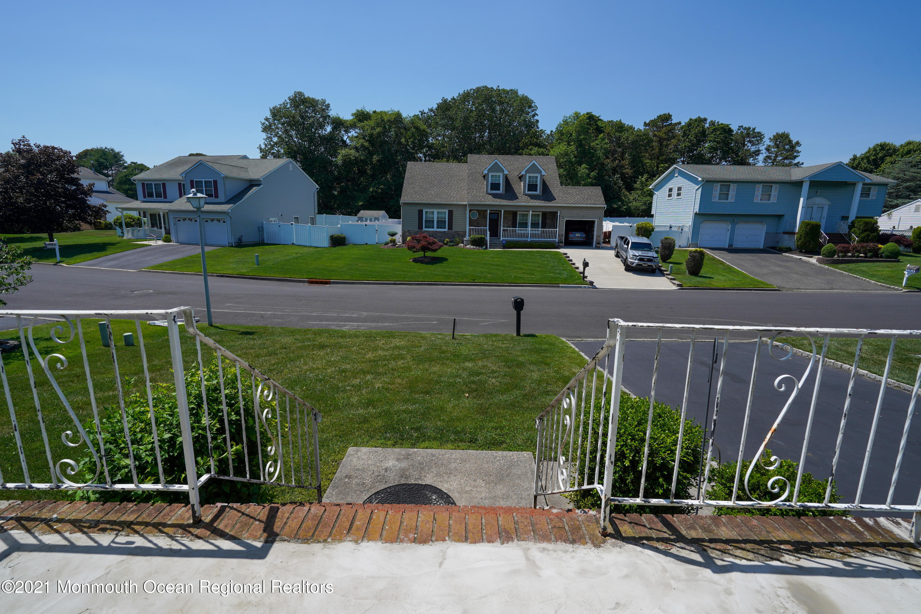 52 Danbury Road Tinton Falls, NJ 07753 - Photo 45 of 50 a view of a street with a building in the background