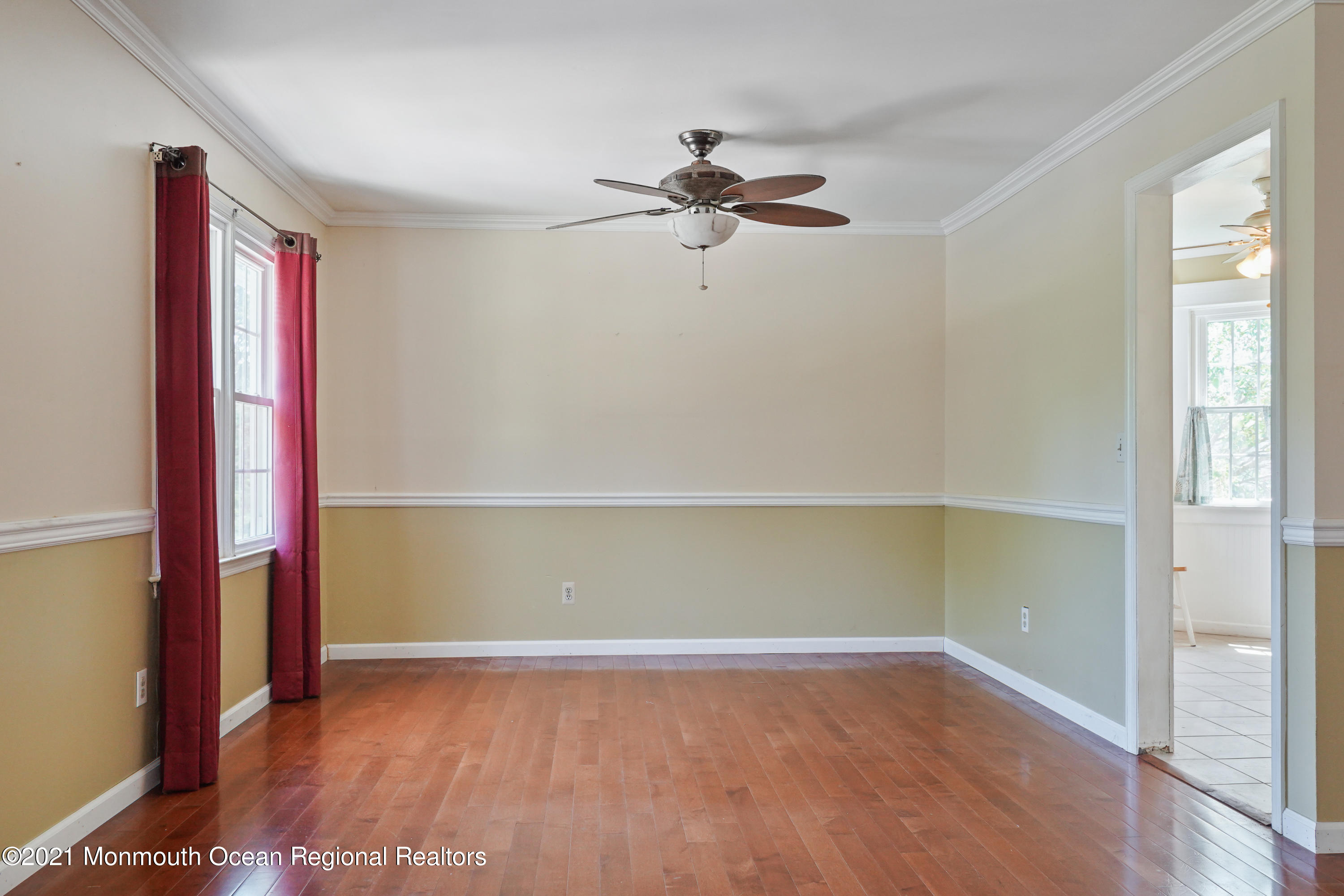 52 Danbury Road Tinton Falls, NJ 07753 - Photo 7 of 50 an empty room with wooden floor closet and windows