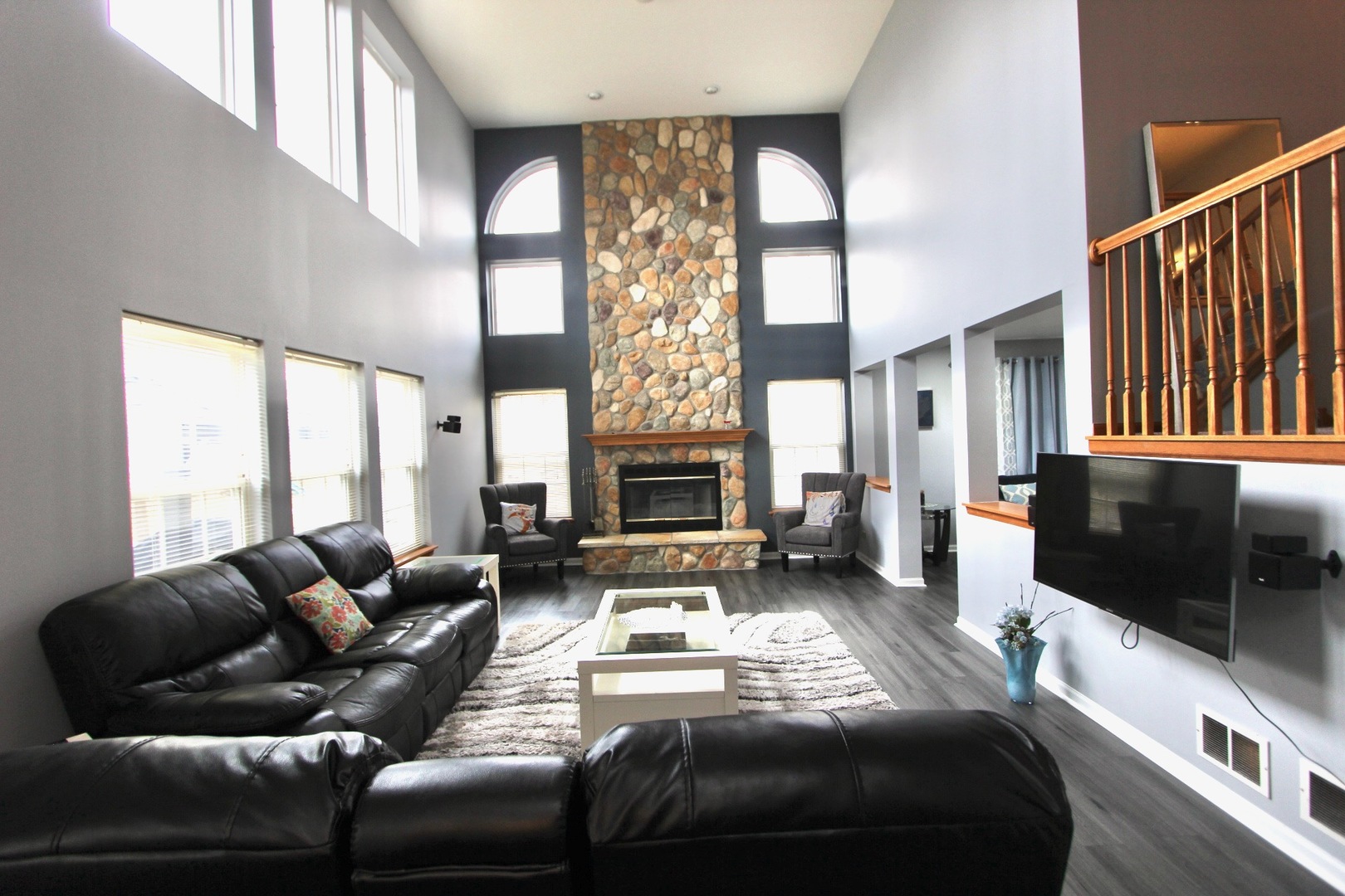1458 Wildmeadow Road Round Lake, IL 60073 - Photo 11 of 45 a living room with furniture fireplace and flat screen tv