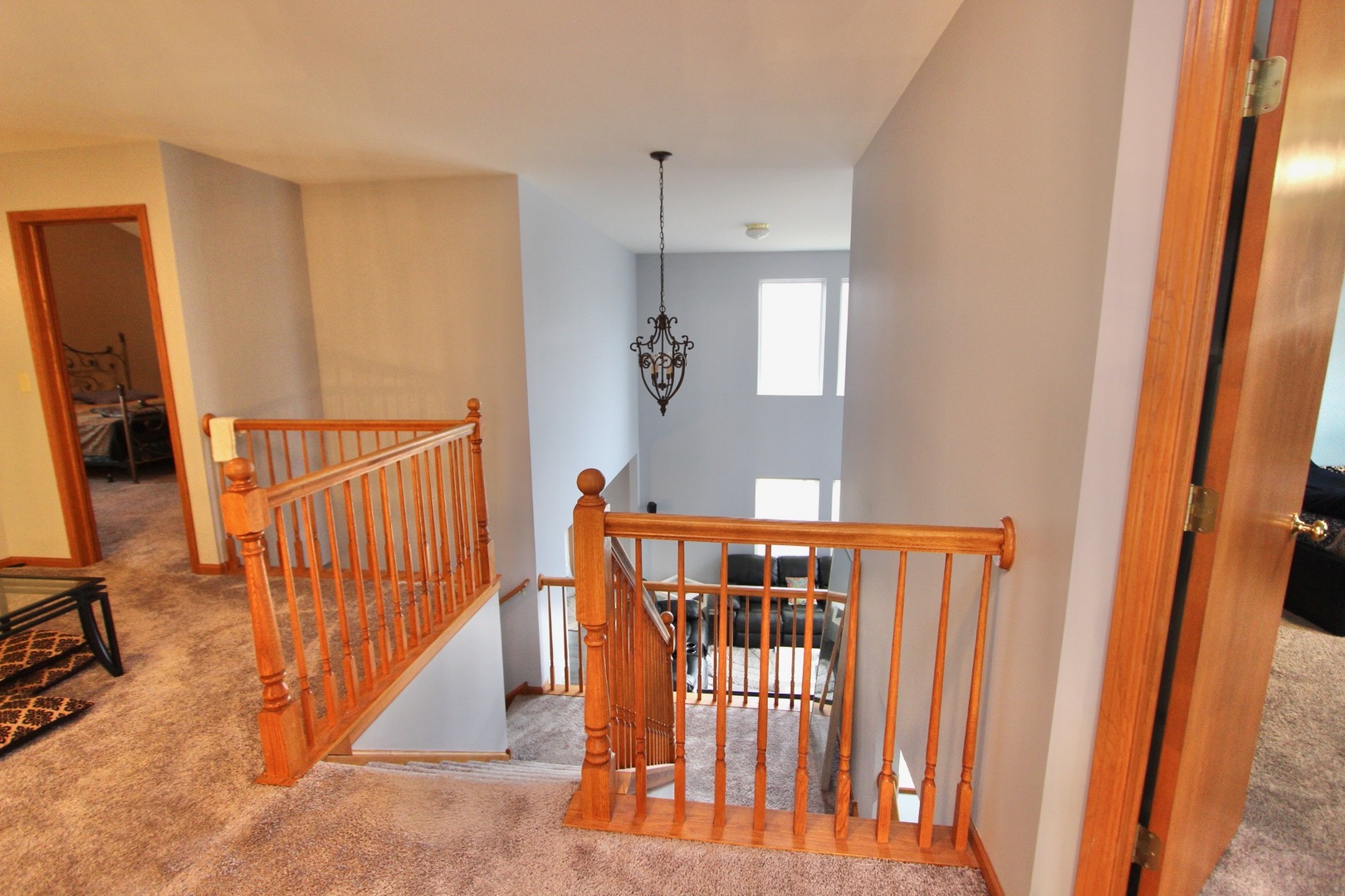 1458 Wildmeadow Road Round Lake, IL 60073 - Photo 19 of 45 a view of a hallway with a livingroom with stairs