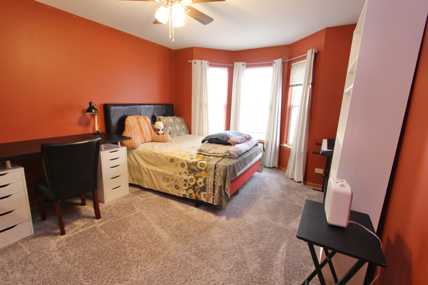 1458 Wildmeadow Road Round Lake, IL 60073 - Photo 22 of 45 a bedroom with a bed and a television