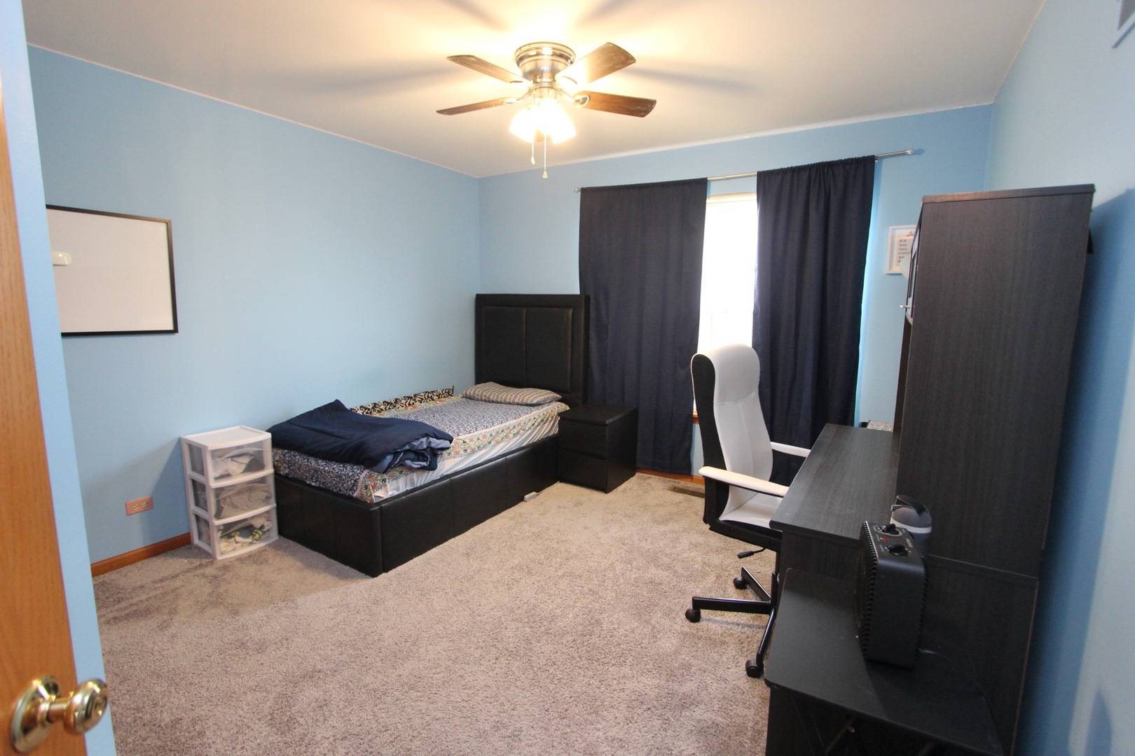 1458 Wildmeadow Road Round Lake, IL 60073 - Photo 23 of 45 a room with furniture and a flat screen tv