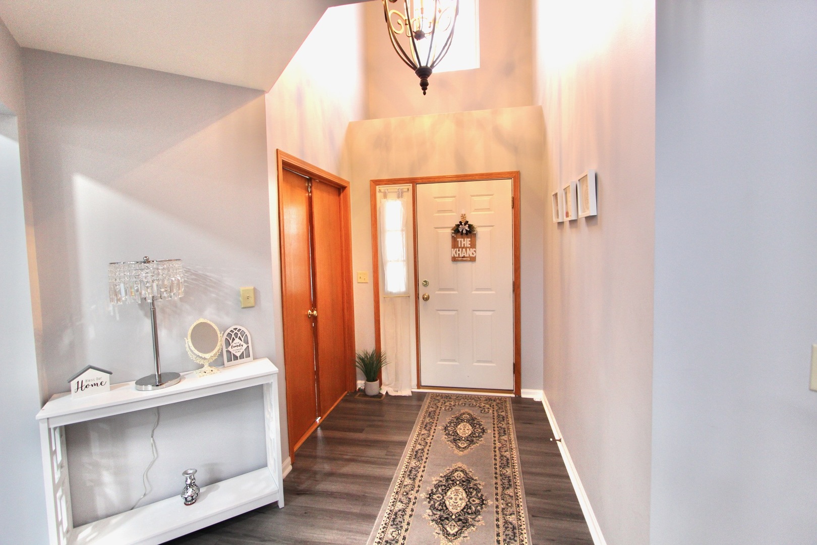 1458 Wildmeadow Road Round Lake, IL 60073 - Photo 3 of 45 a bathroom with a sink mirror and a bathtub