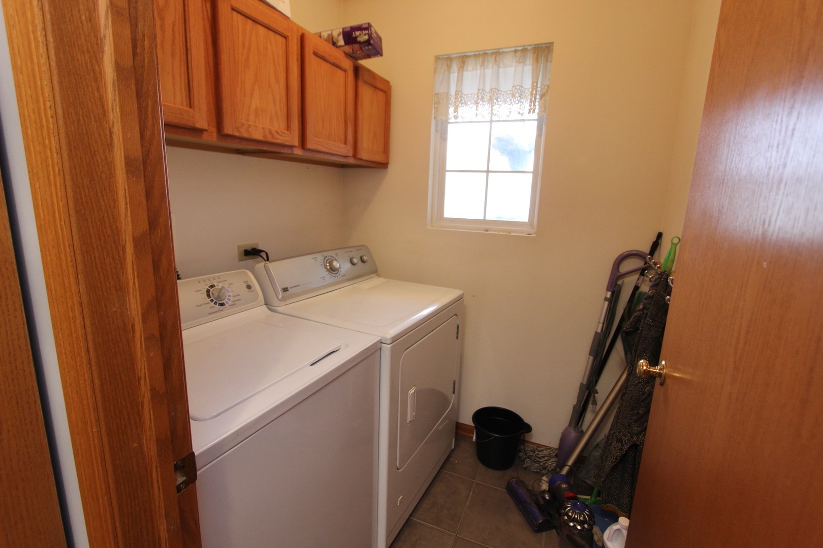 1458 Wildmeadow Road Round Lake, IL 60073 - Photo 34 of 45 a utility room with dryer and washer