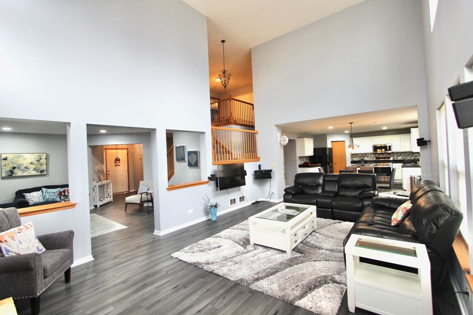 1458 Wildmeadow Road Round Lake, IL 60073 - Photo 10 of 45 a living room with furniture and wooden floor