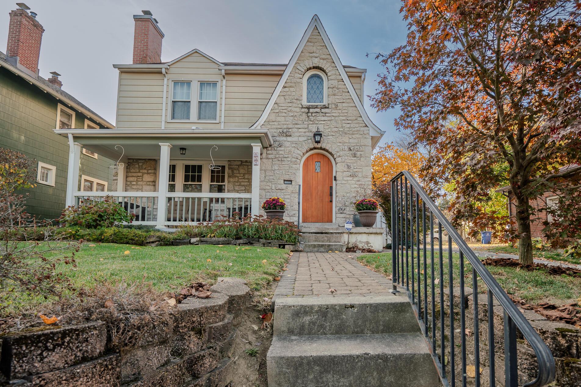 Classic two tudor lines, lovely stone gable entry.