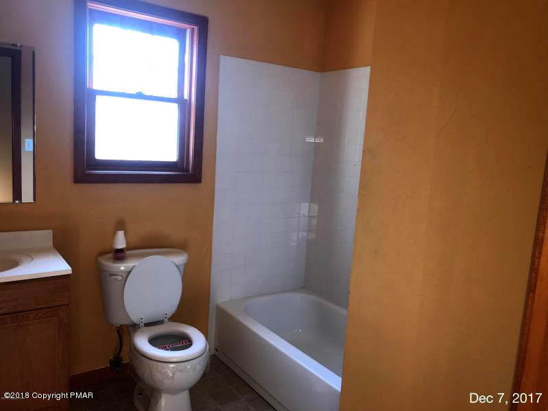 592 Cold Springs Road East Stroudsburg, PA 18302 - Photo 6 of 12 a bathroom with a sink and a toilet