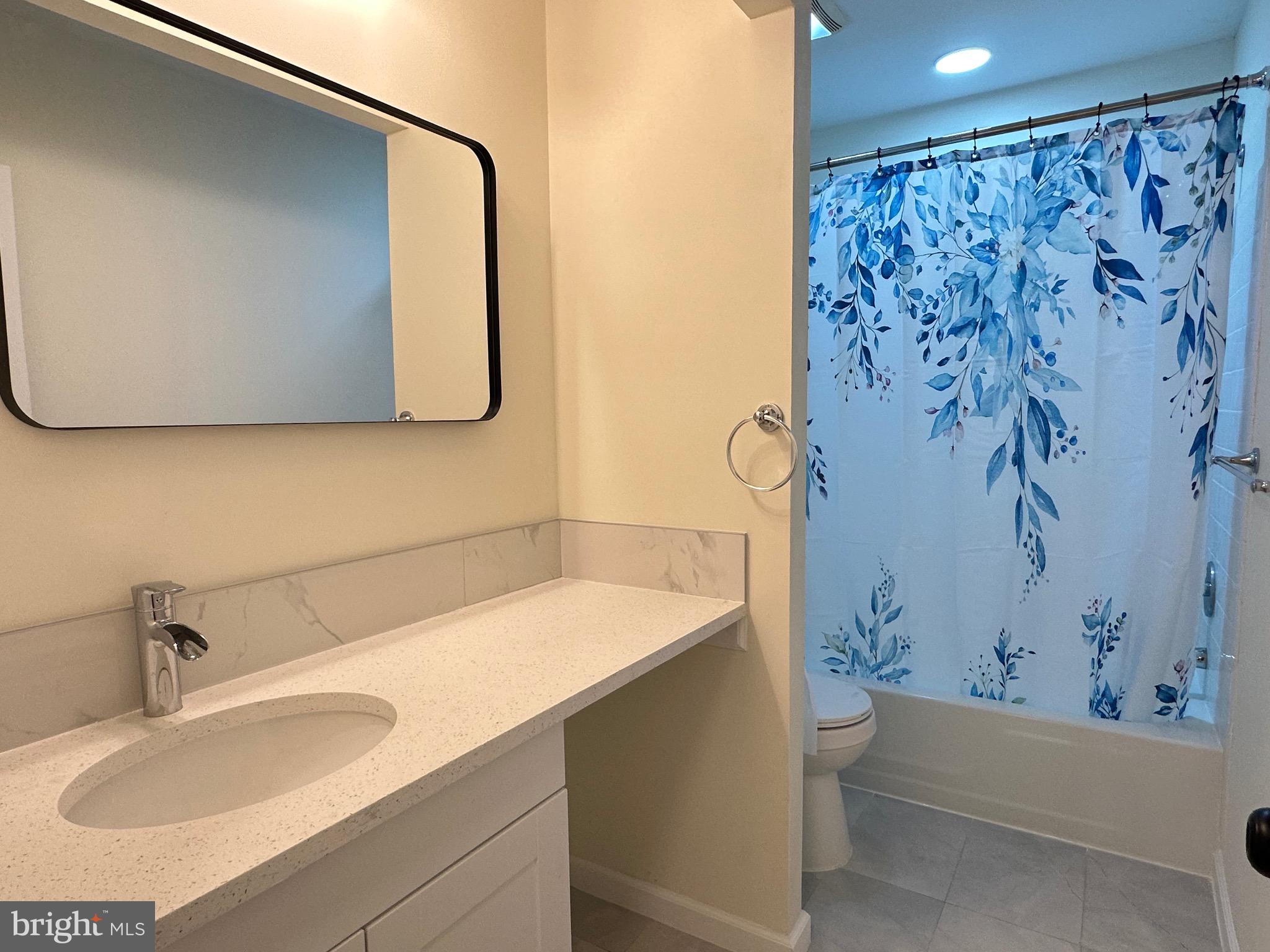 3 Centennial Road Telford, PA 18969 - Photo 17 of 25 a bathroom with a sink and a mirror