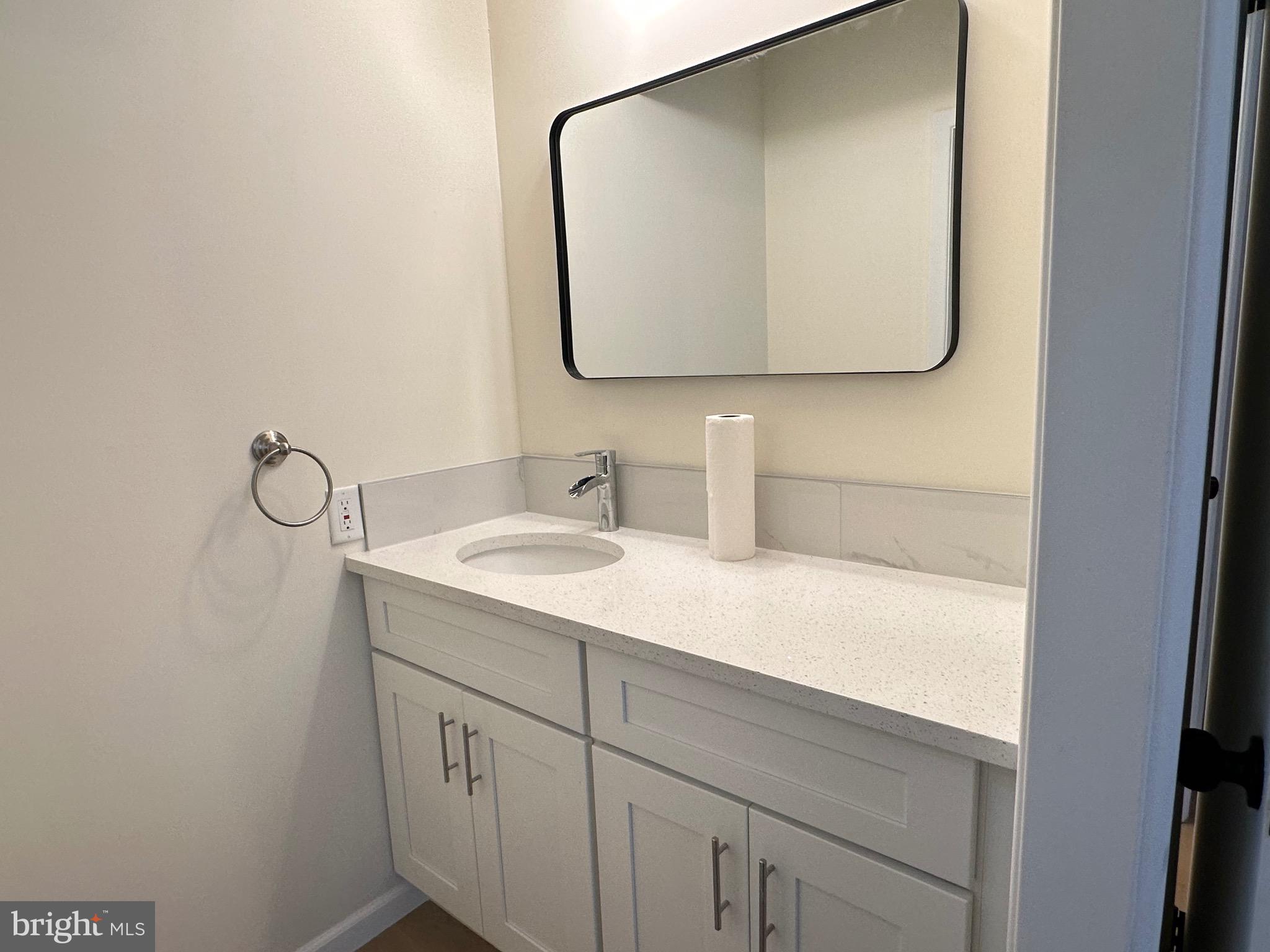 3 Centennial Road Telford, PA 18969 - Photo 21 of 25 a bathroom with a sink vanity and mirror