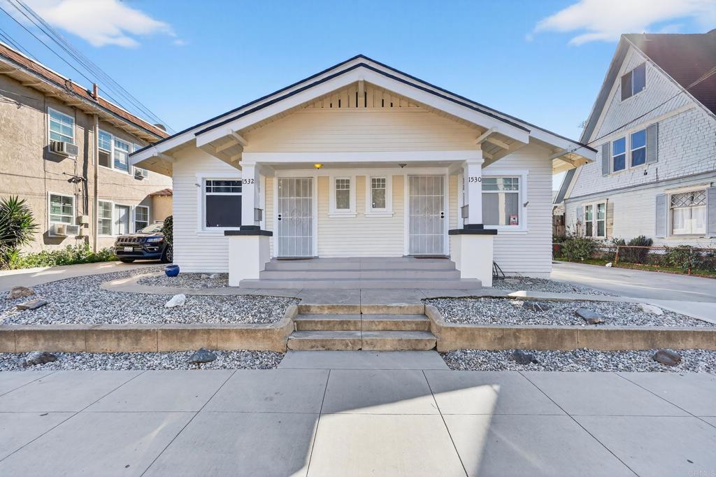1530 East Appleton Street Long Beach, CA 90802 - Photo 4 of 61 a front view of a house with a yard
