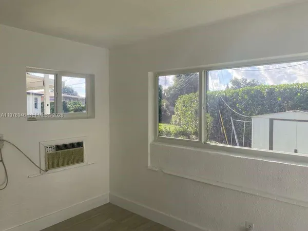 a view of a back yard of the house