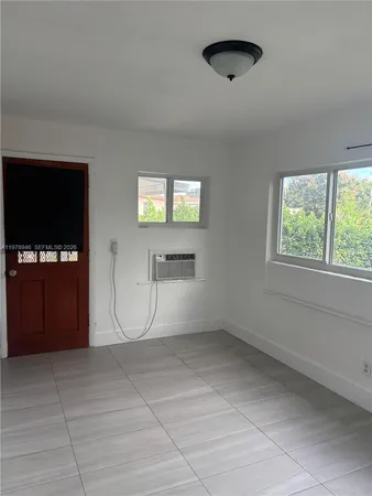 a view of house with yard