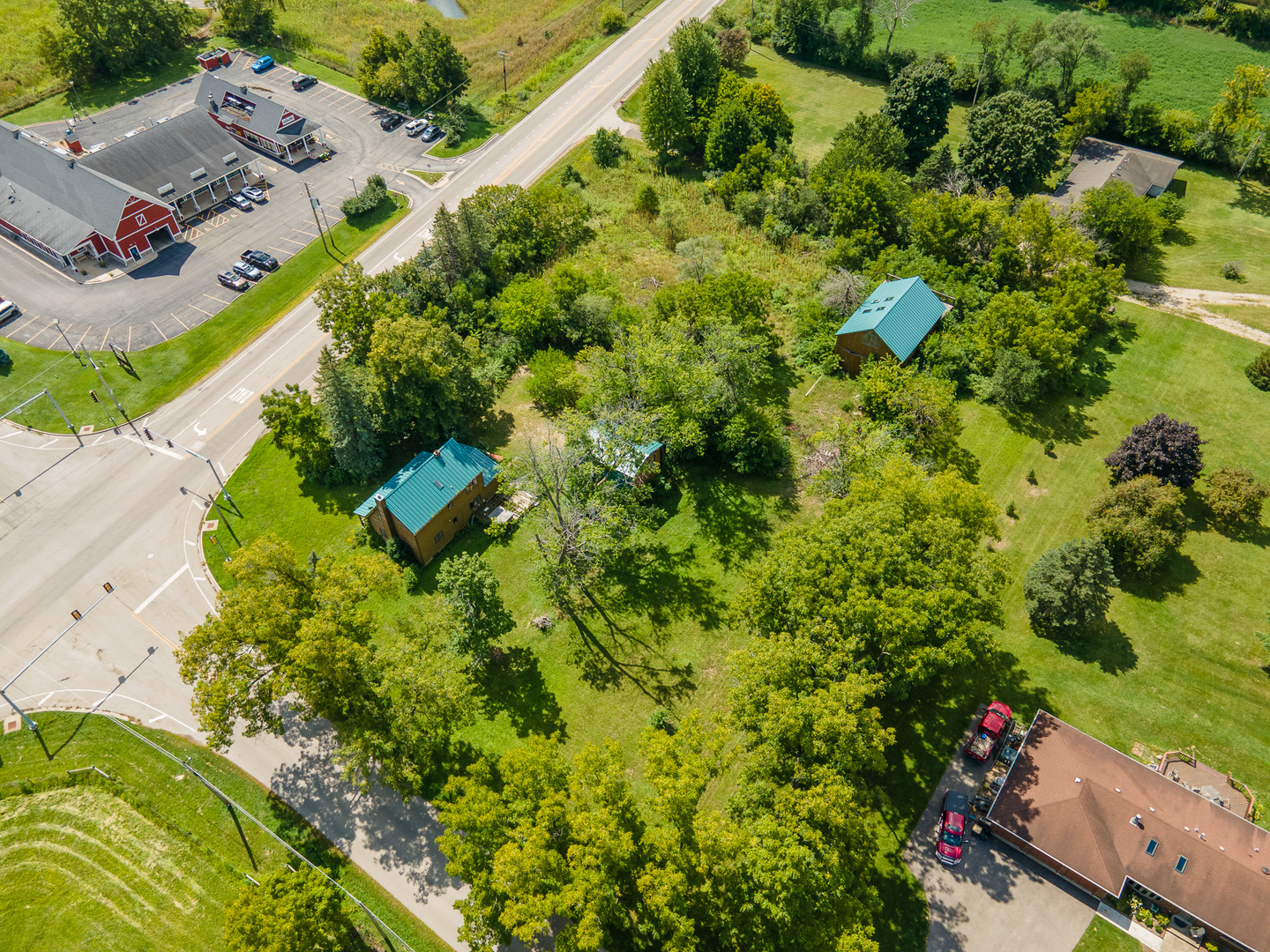 3104 Highway 176 Prairie Grove, IL 60012 - Photo 6 of 7 an aerial view of residential house with outdoor space and trees all around