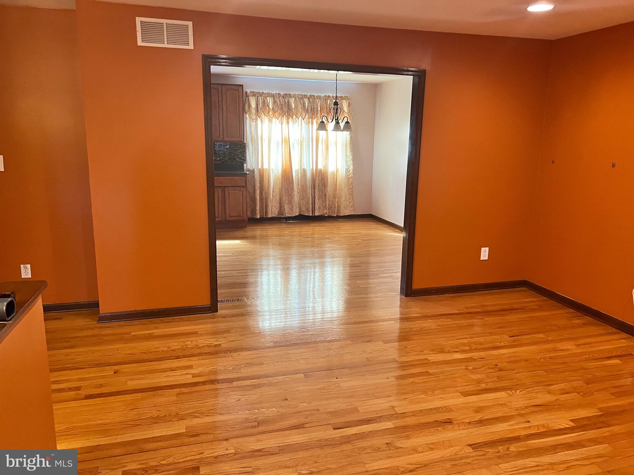 40 Longleaf Lane Bear, DE 19701 - Photo 6 of 24 Living room looking into dining room