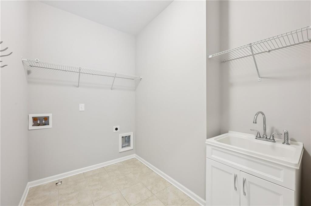 3328 Knight Road Marietta, GA 30066 - Photo 21 of 44 a bathroom with a sink and vanity