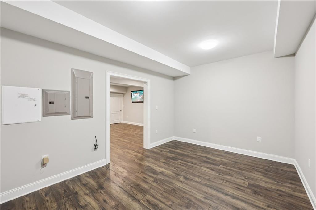3328 Knight Road Marietta, GA 30066 - Photo 25 of 44 a view of livingroom with hardwood and hallway