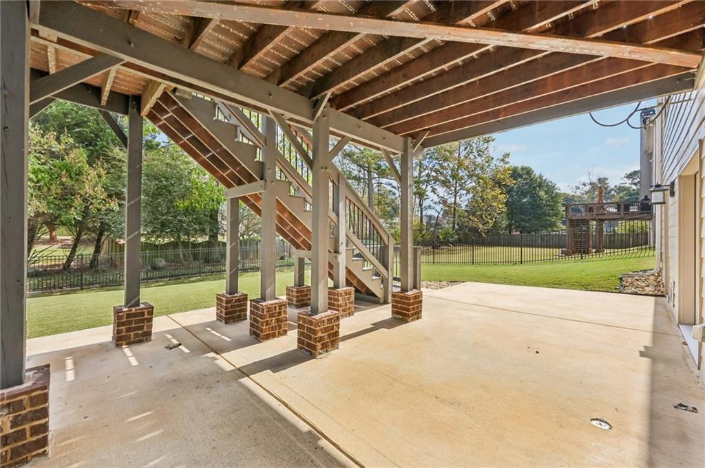 3328 Knight Road Marietta, GA 30066 - Photo 31 of 44 a view of swimming pool with a patio