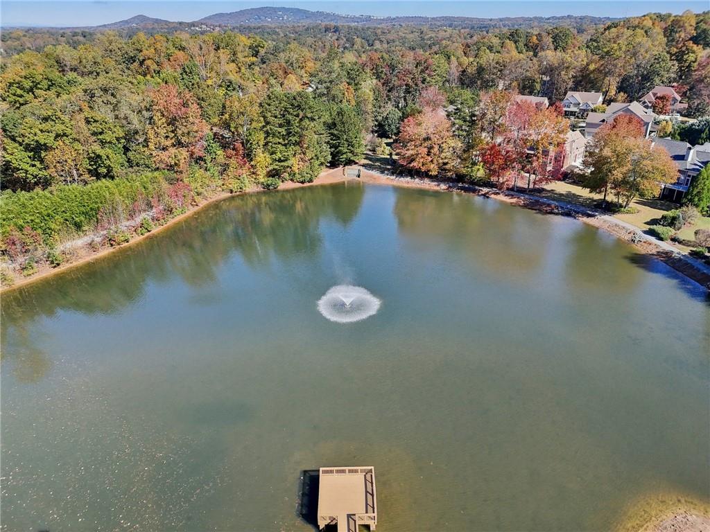 3328 Knight Road Marietta, GA 30066 - Photo 38 of 44 an aerial view of residential houses with outdoor space and lake view