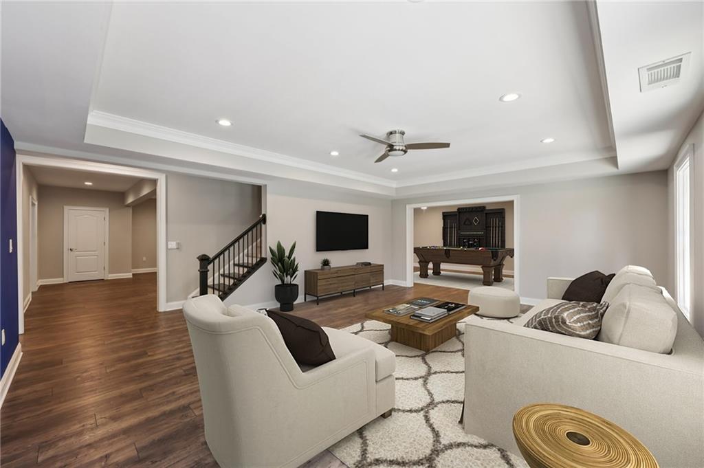 3328 Knight Road Marietta, GA 30066 - Photo 5 of 44 a living room with furniture and a flat screen tv