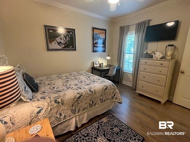 450 Park Avenue, Unit 112 Foley, AL 36535 - Photo 13 of 20 Bedroom with wood finished floors, crown molding, and ceiling fan