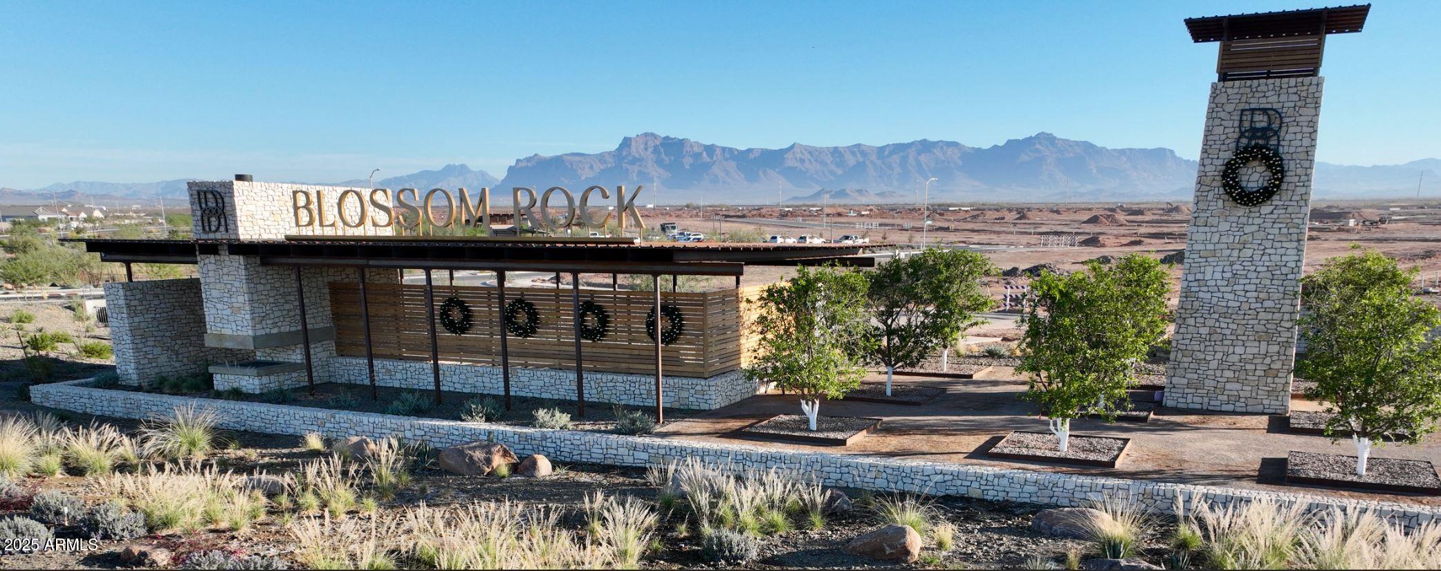 415 West Fremont Pass Apache Junction, AZ 85120 - Photo 6 of 34 an outdoor view of building with yard