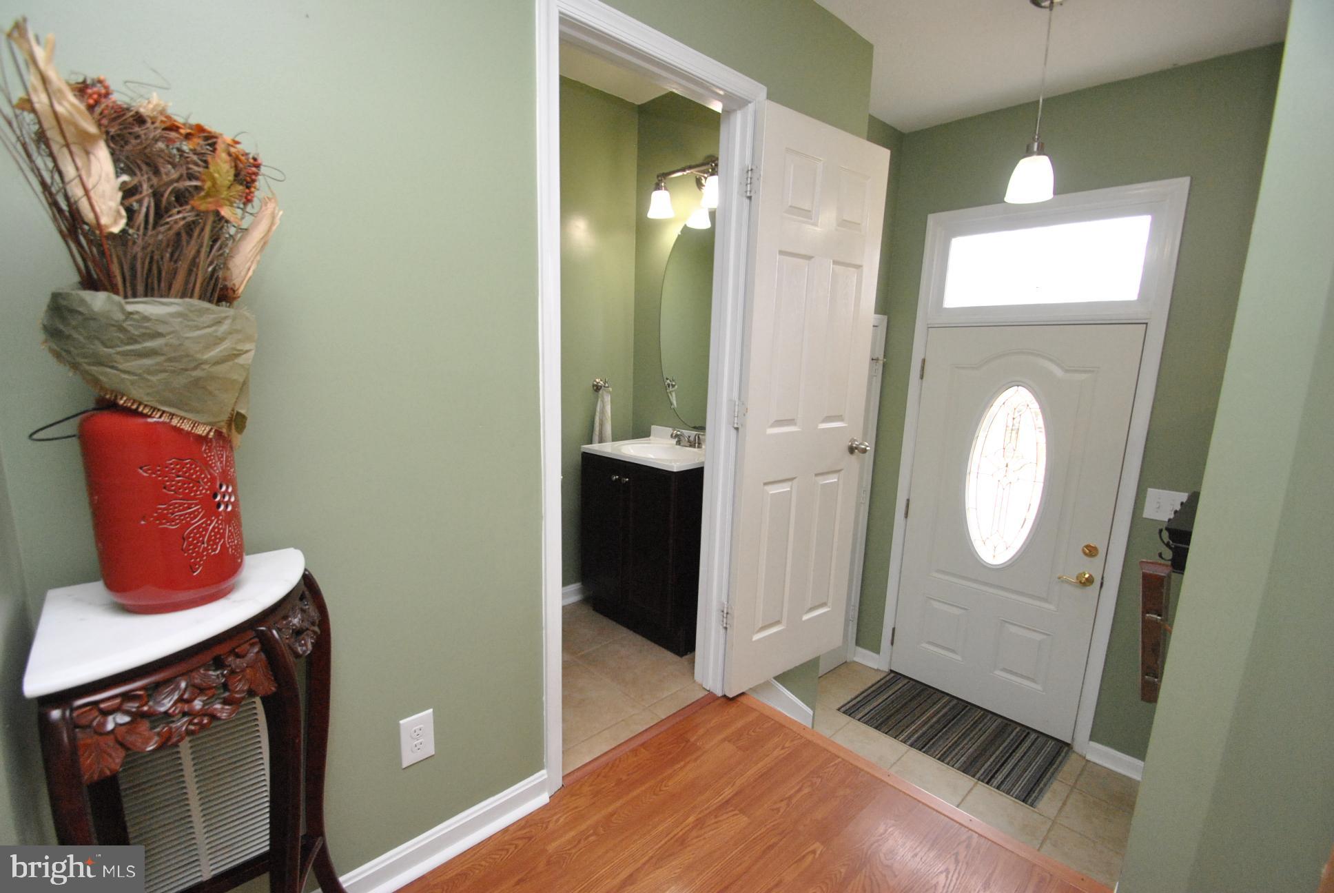 52 Powder View Court Baltimore, MD 21236 - Photo 4 of 19 1/2 BATH ON MAIN ENTRANCE LEVEL