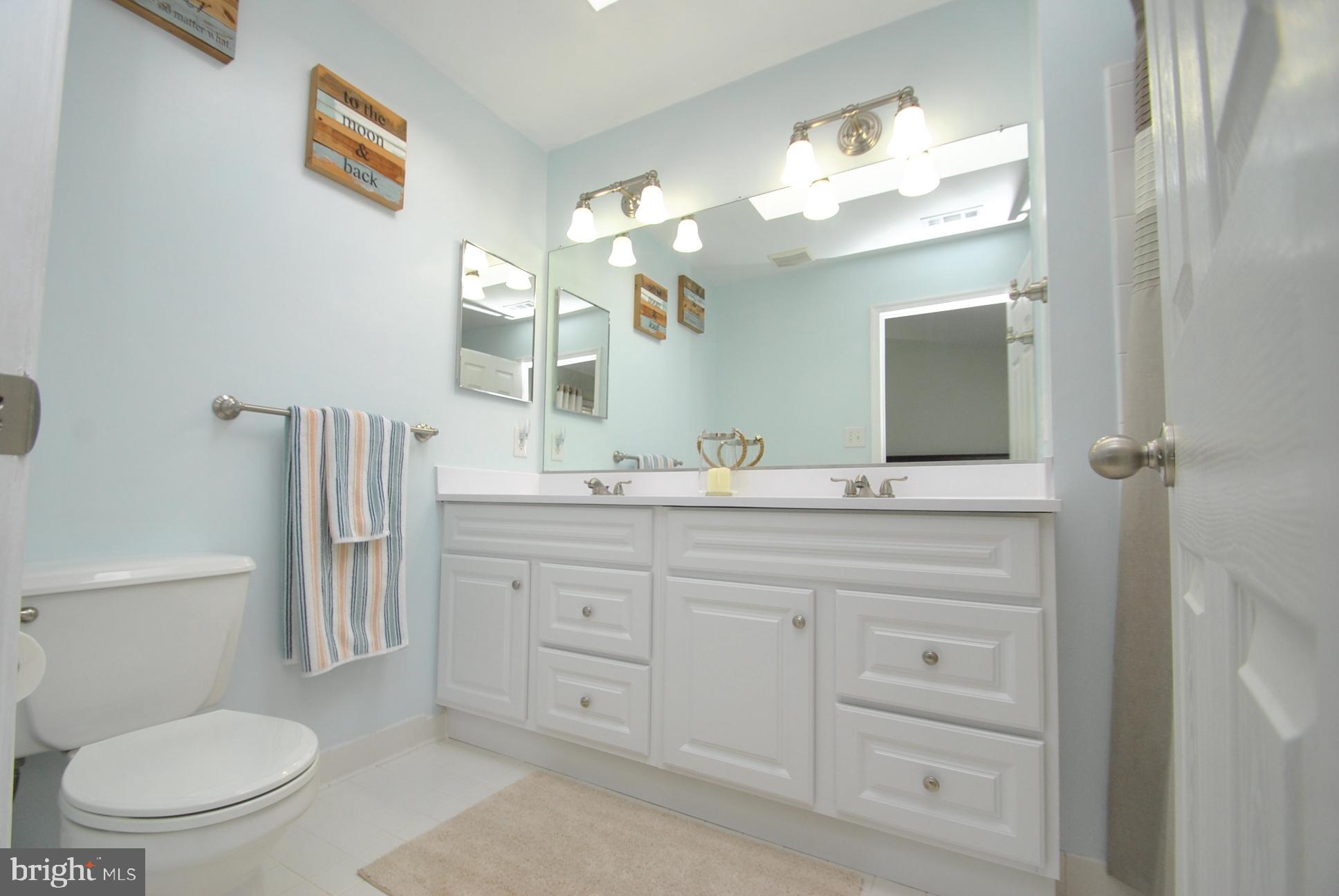 52 Powder View Court Baltimore, MD 21236 - Photo 9 of 19 OWNERS SUITE UPDATED FULL BATH & DOUBLE VANITIES