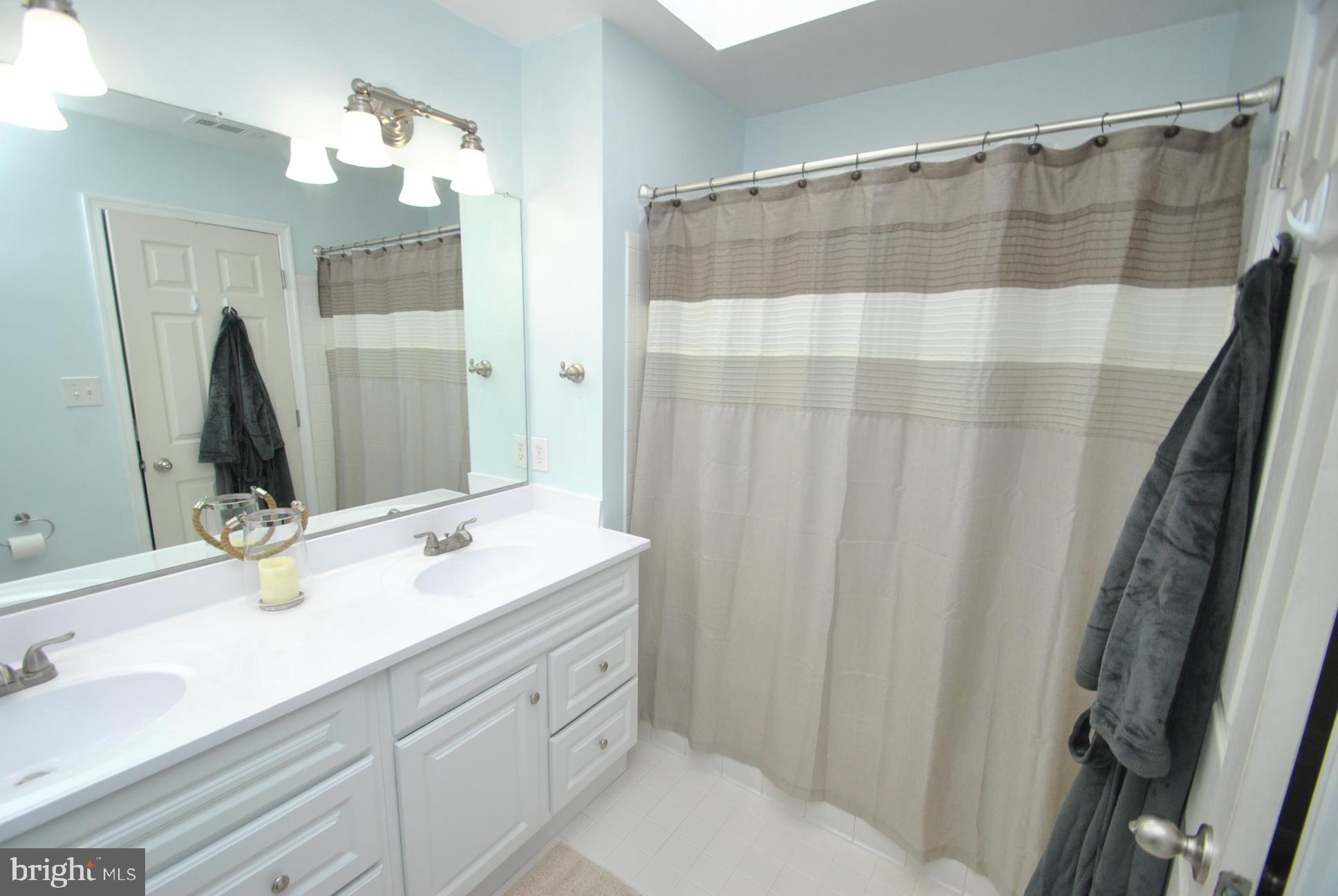 52 Powder View Court Baltimore, MD 21236 - Photo 10 of 19 OWNERS SUITE UPDATED FULL BATH & DOUBLE VANITIES