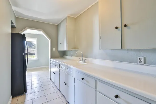 a bathroom with a sink a mirror and a shower
