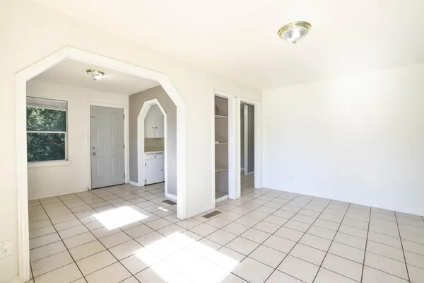 a view of an empty room with window