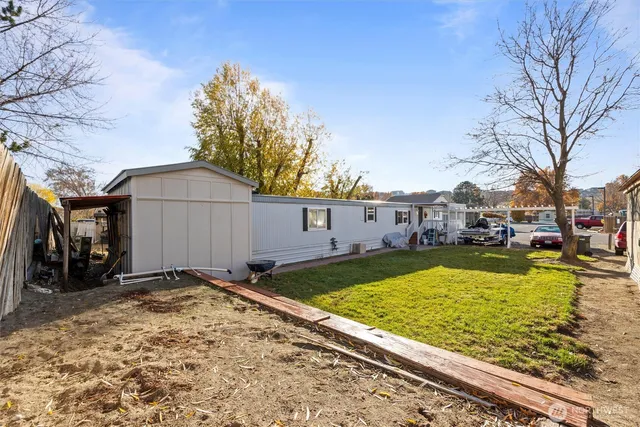 a view of swimming pool with a patio