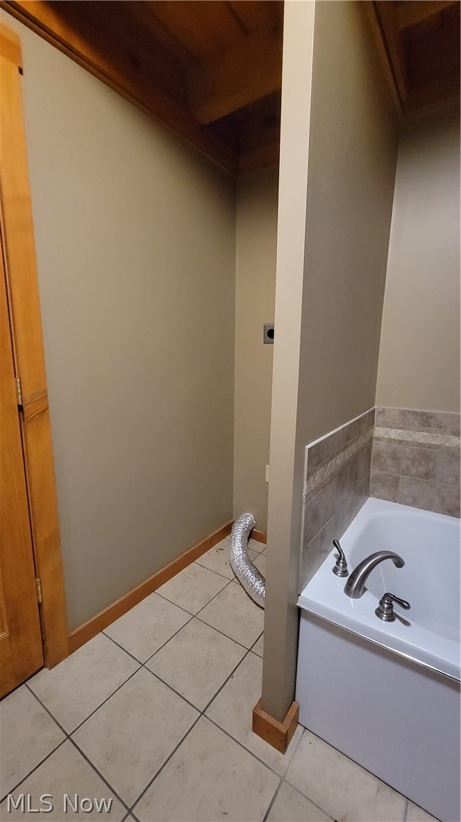 4325 Pleasant Ridge Road Marietta, OH 45750 - Photo 19 of 35 Bathroom featuring a bath and tile flooring