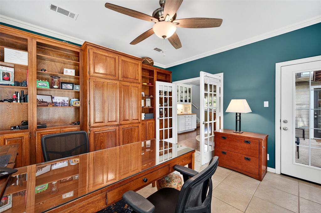 10312 Arvin Hill Road Aubrey, TX 76227 - Photo 19 of 40 a room with furniture and chandelier