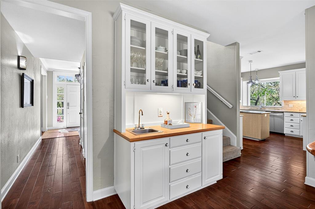 10312 Arvin Hill Road Aubrey, TX 76227 - Photo 22 of 40 a view of a walk in closet and wooden floor